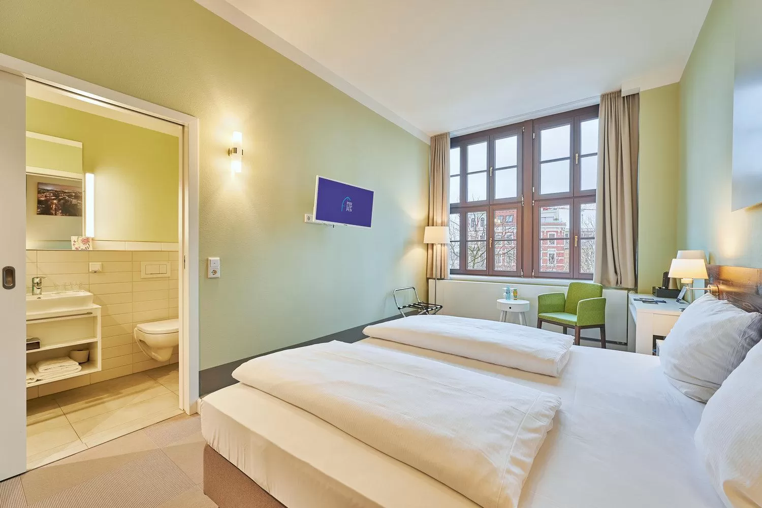 Photo of the whole room, Bed in Philippus Inklusionshotel Leipzig