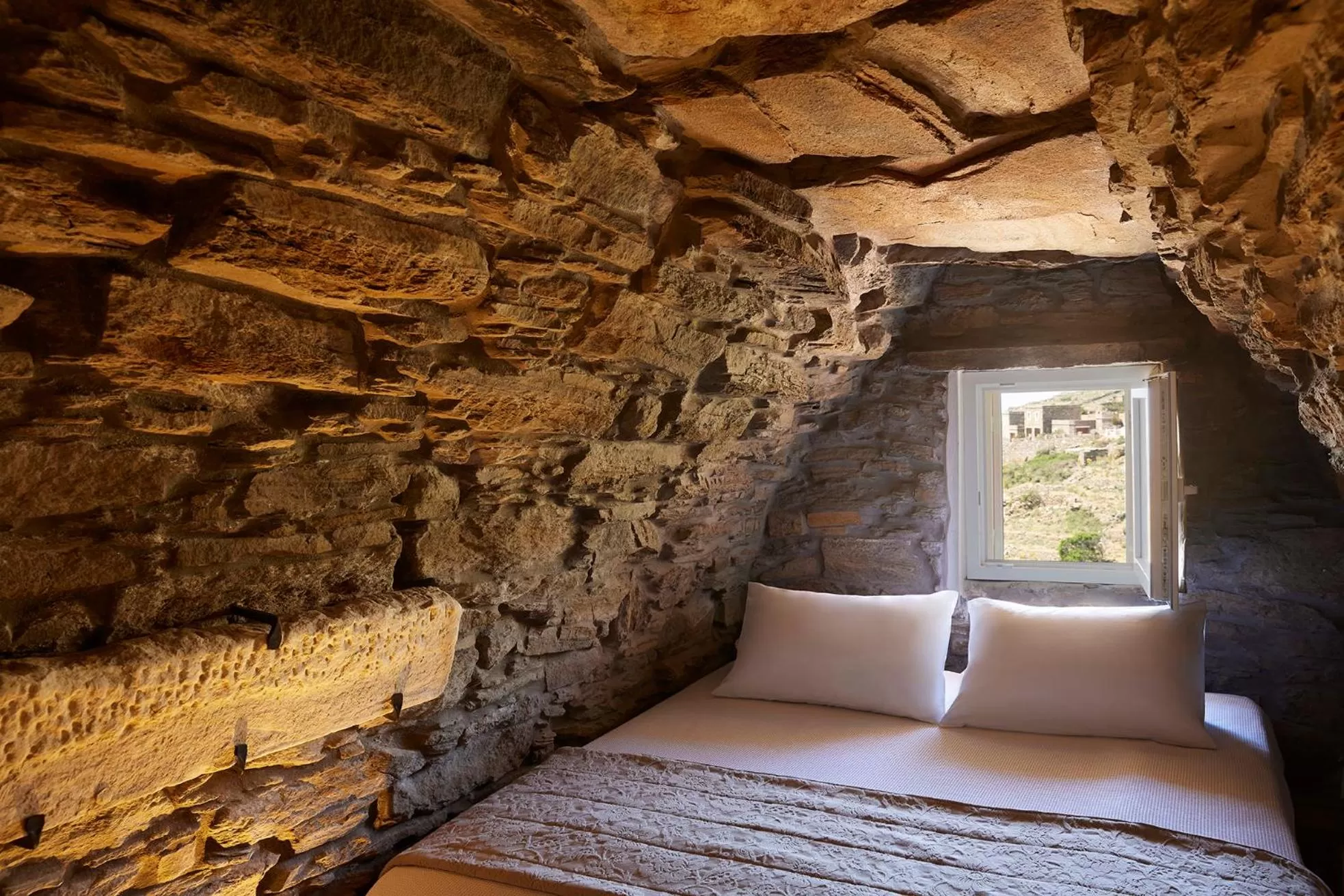 Bed in Aeolis Tinos Suites