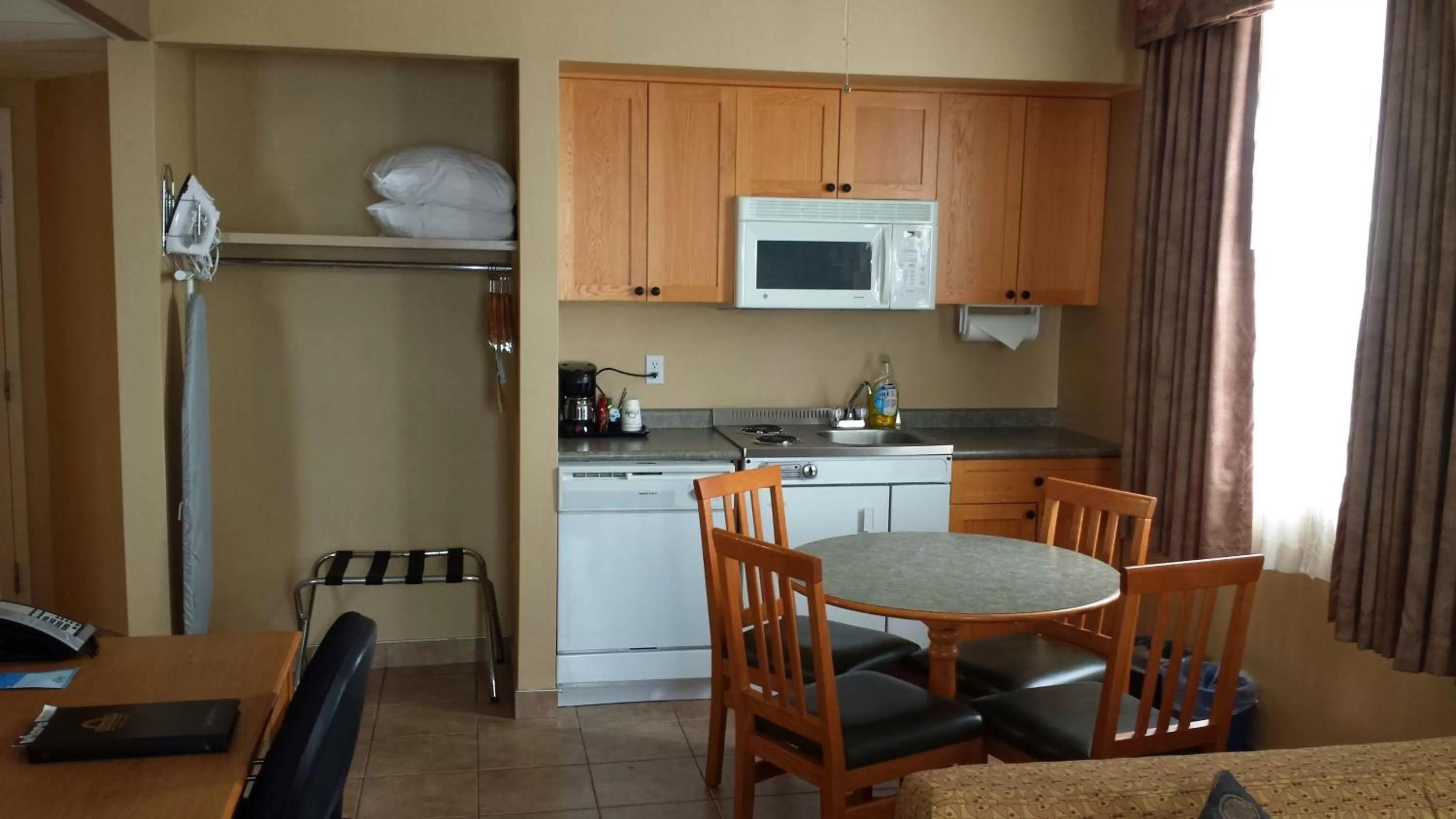 Kitchen or kitchenette in Days Inn & Suites by Wyndham West Edmonton