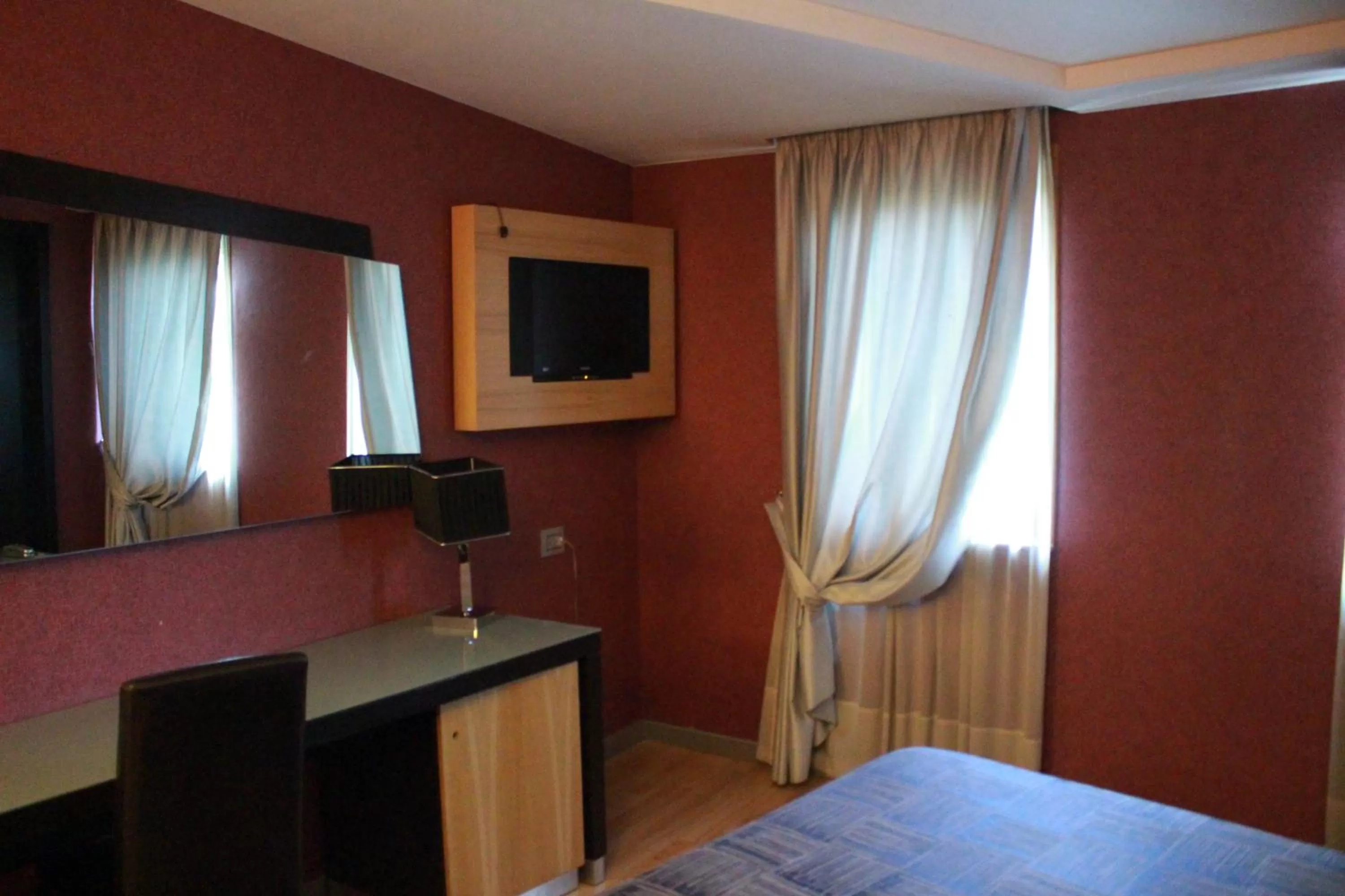 TV and multimedia, Bed in Hotel Ginepro