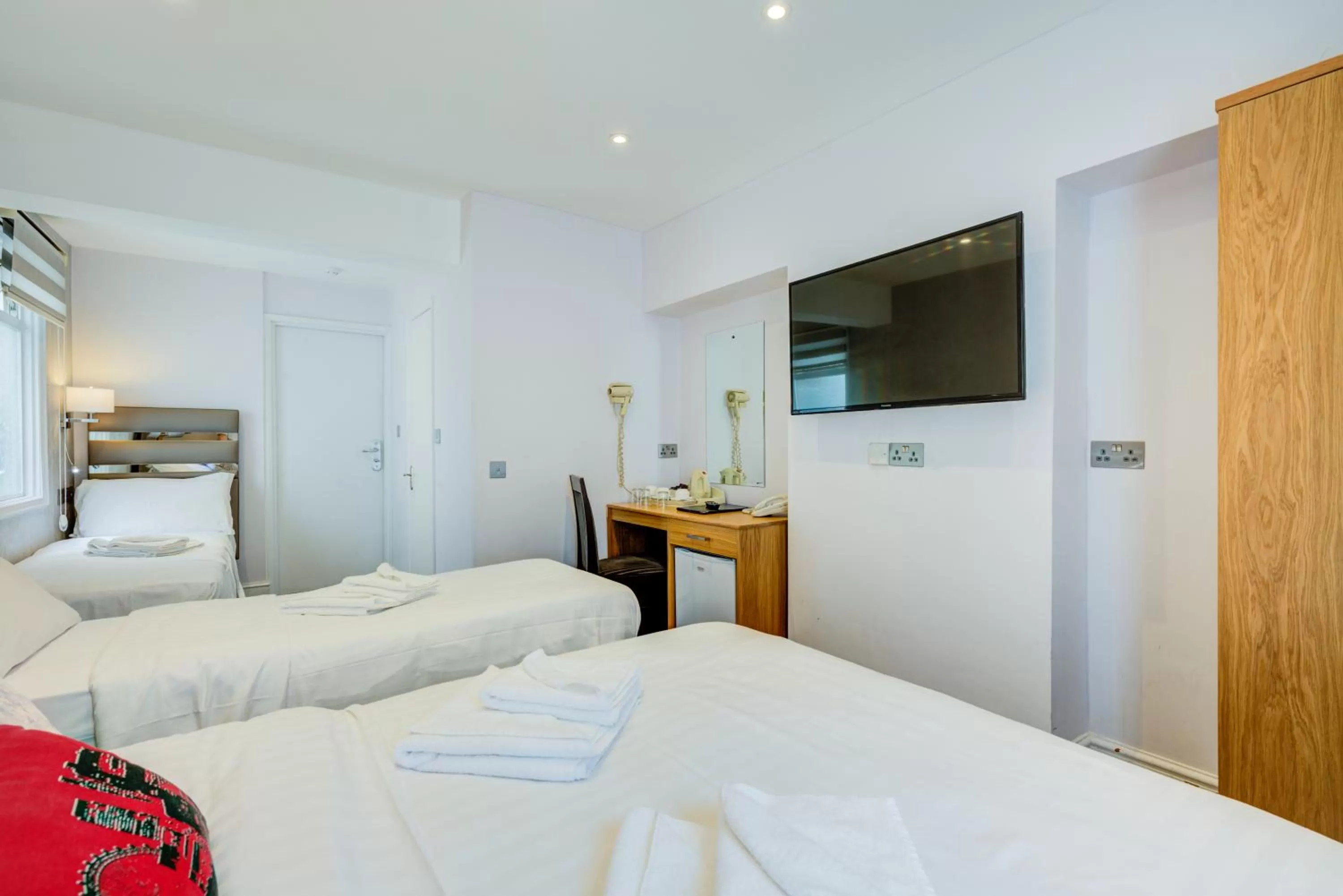 Bed in Admiral Hotel at Park Avenue