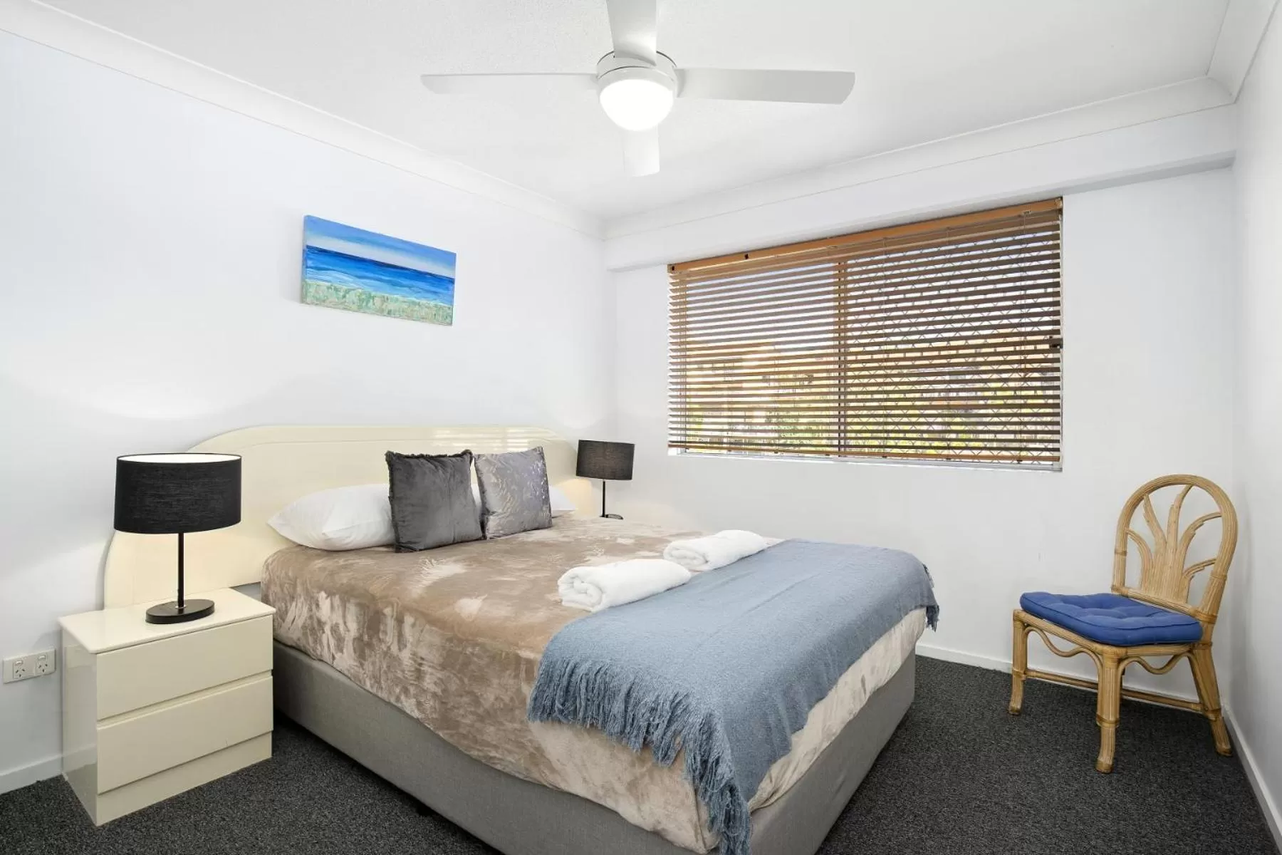 Bed in Kirra Palms Holiday Apartments