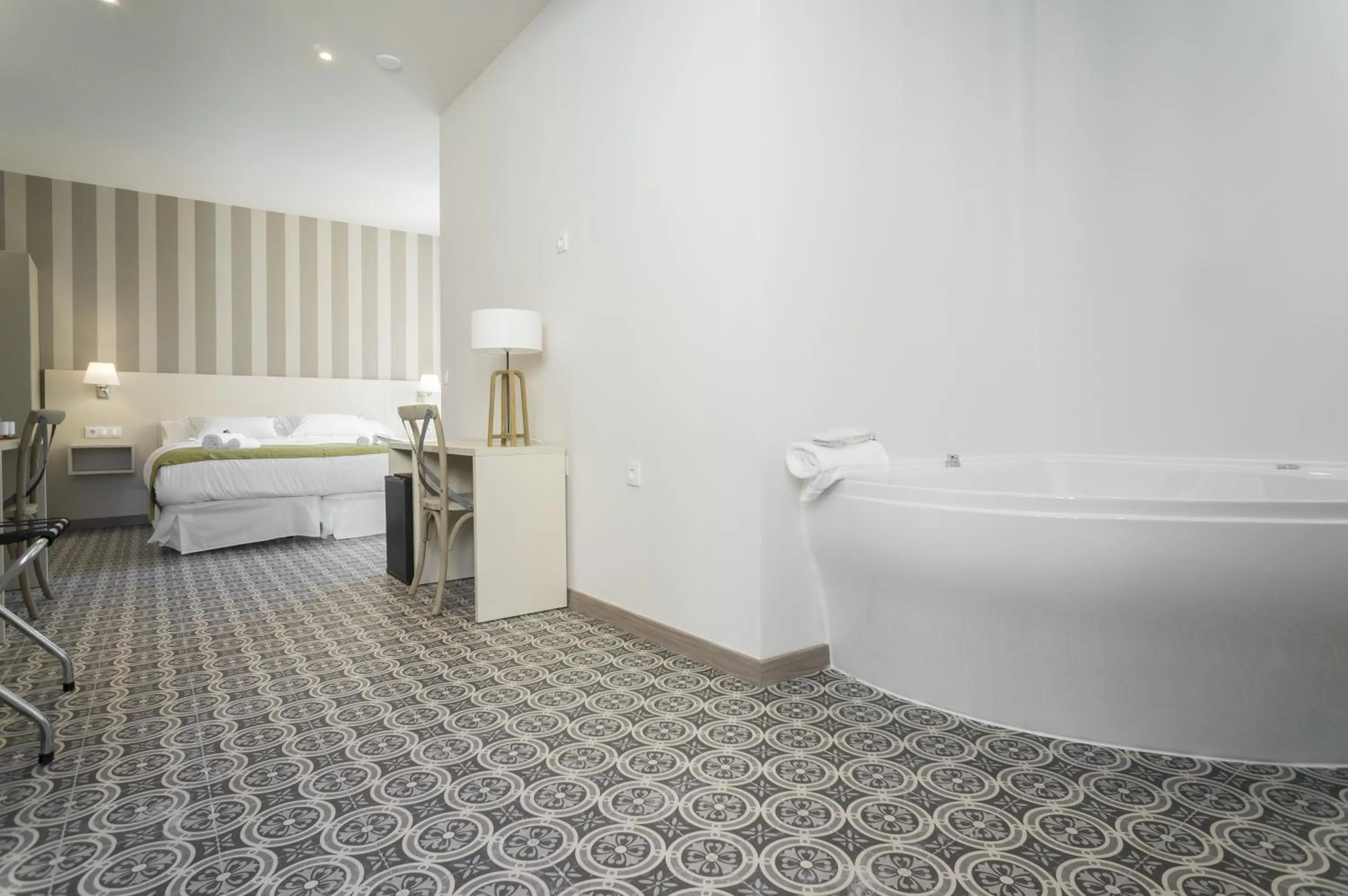 Bed in Hotel San Lorenzo Boutique Plaza