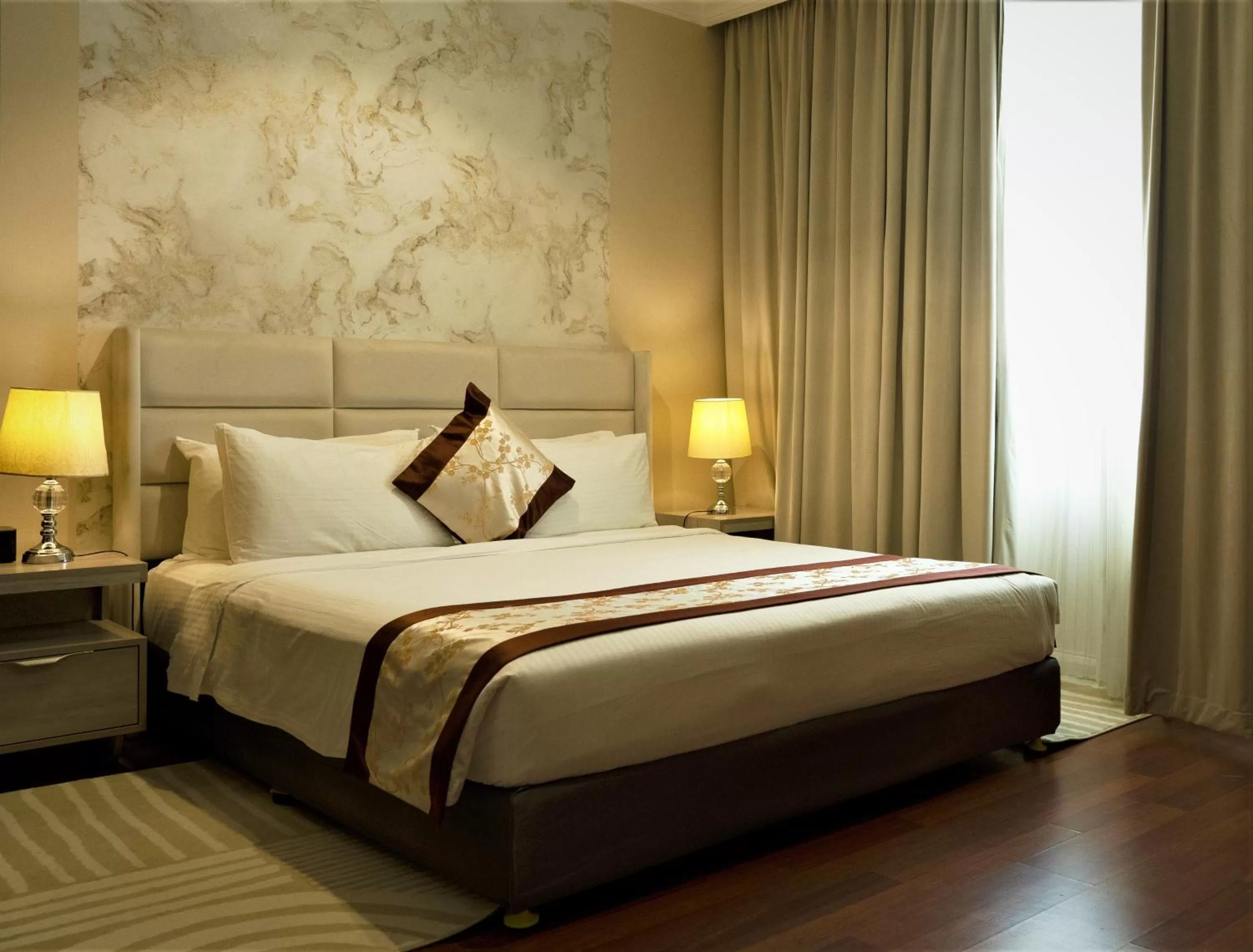 Bed in City Tower Hotel