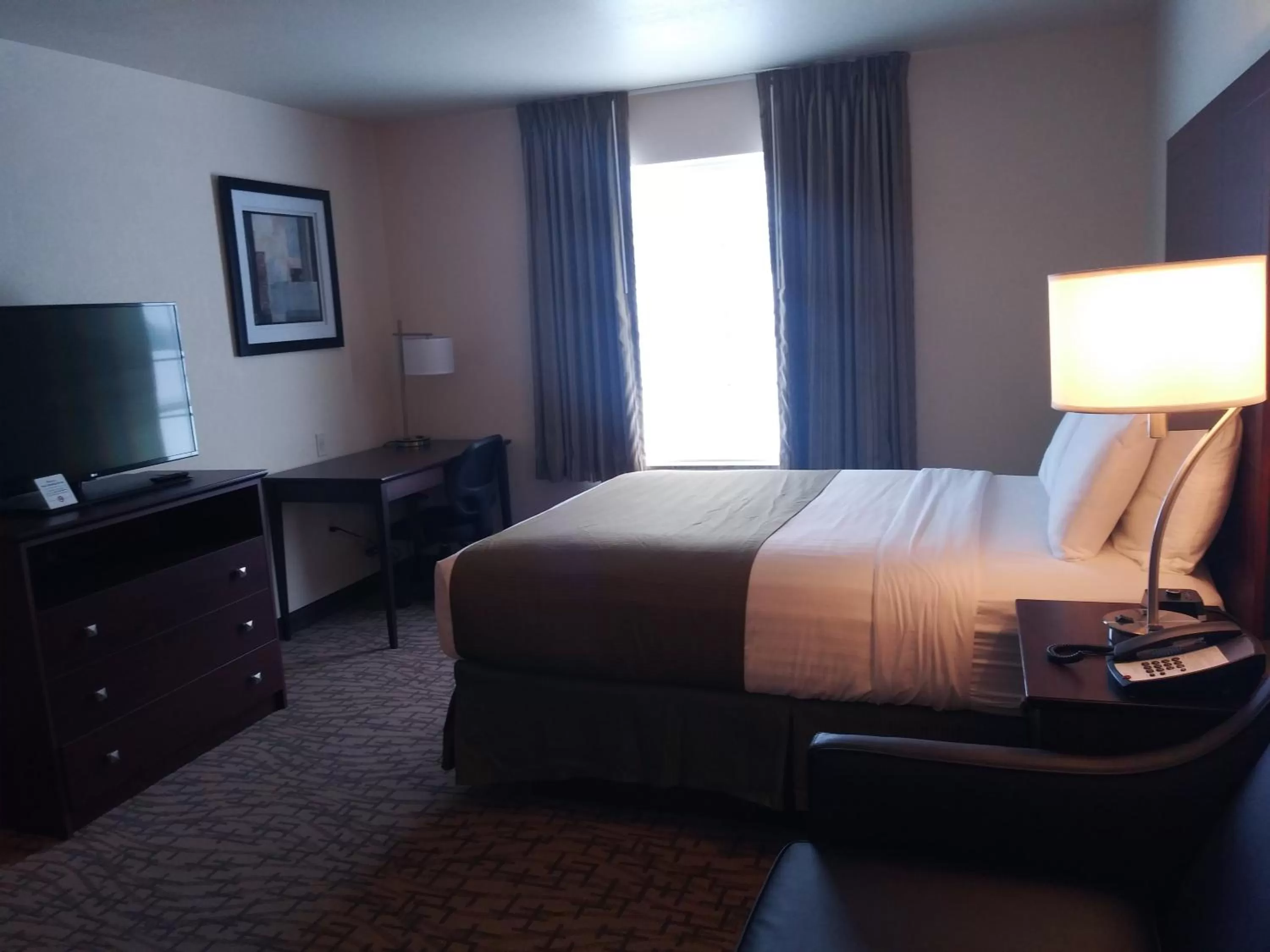 Bed in Cobblestone Inn & Suites - Barron