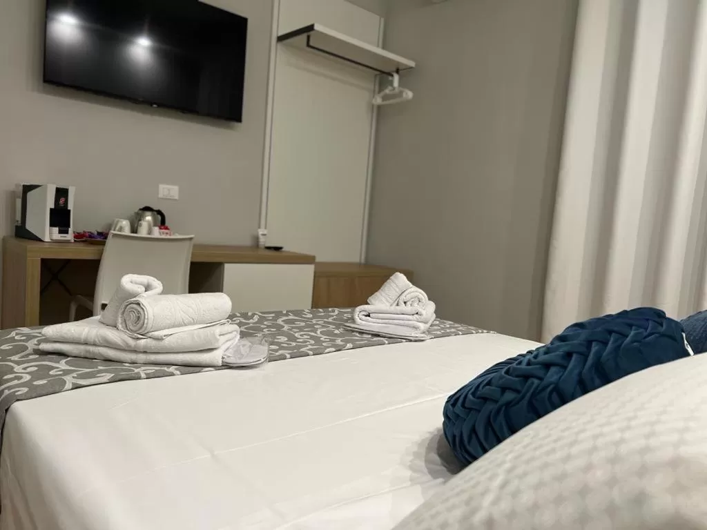 Bed in Nike Luxury Rooms