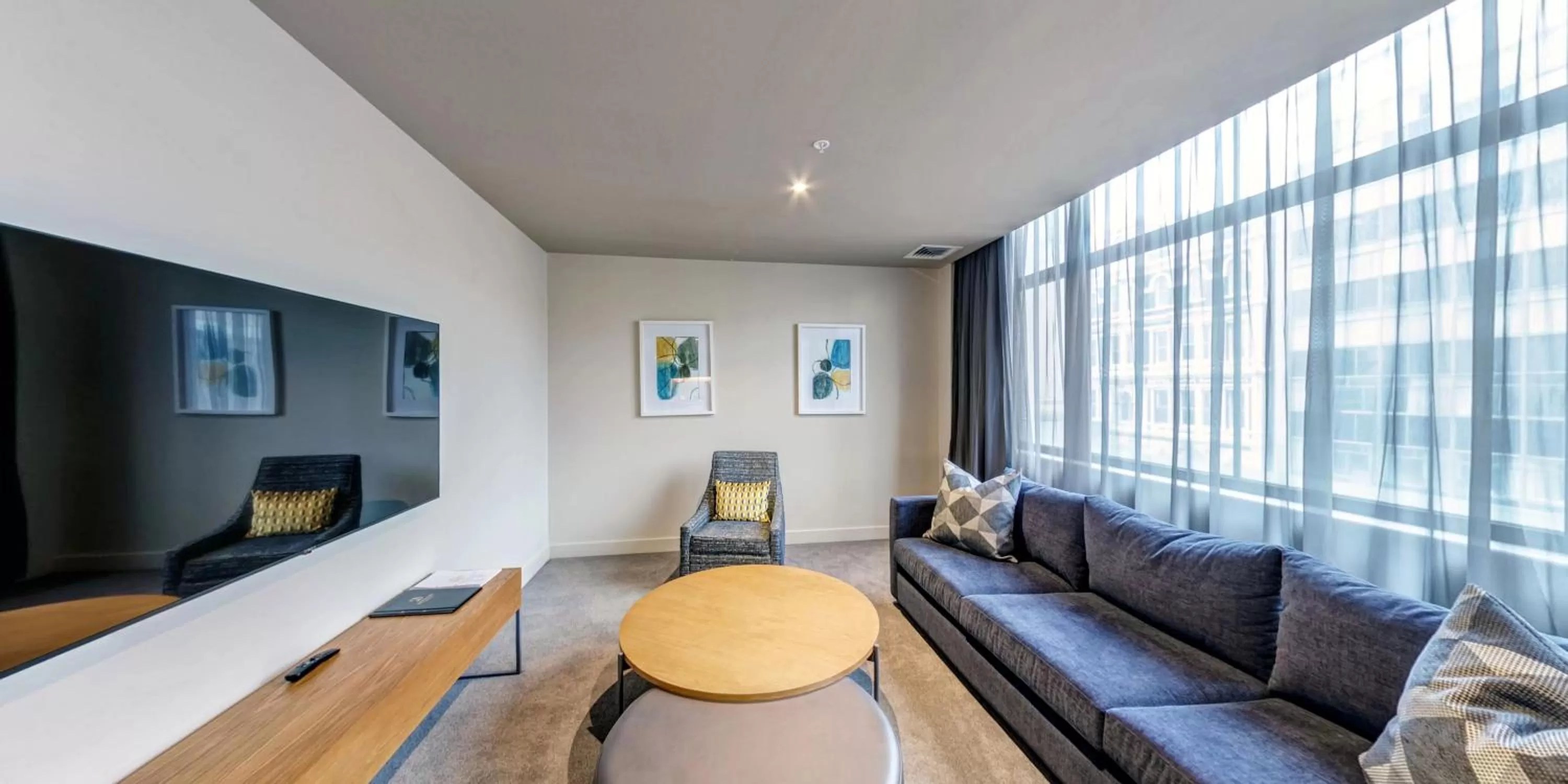 Seating area in Distinction Dunedin Hotel