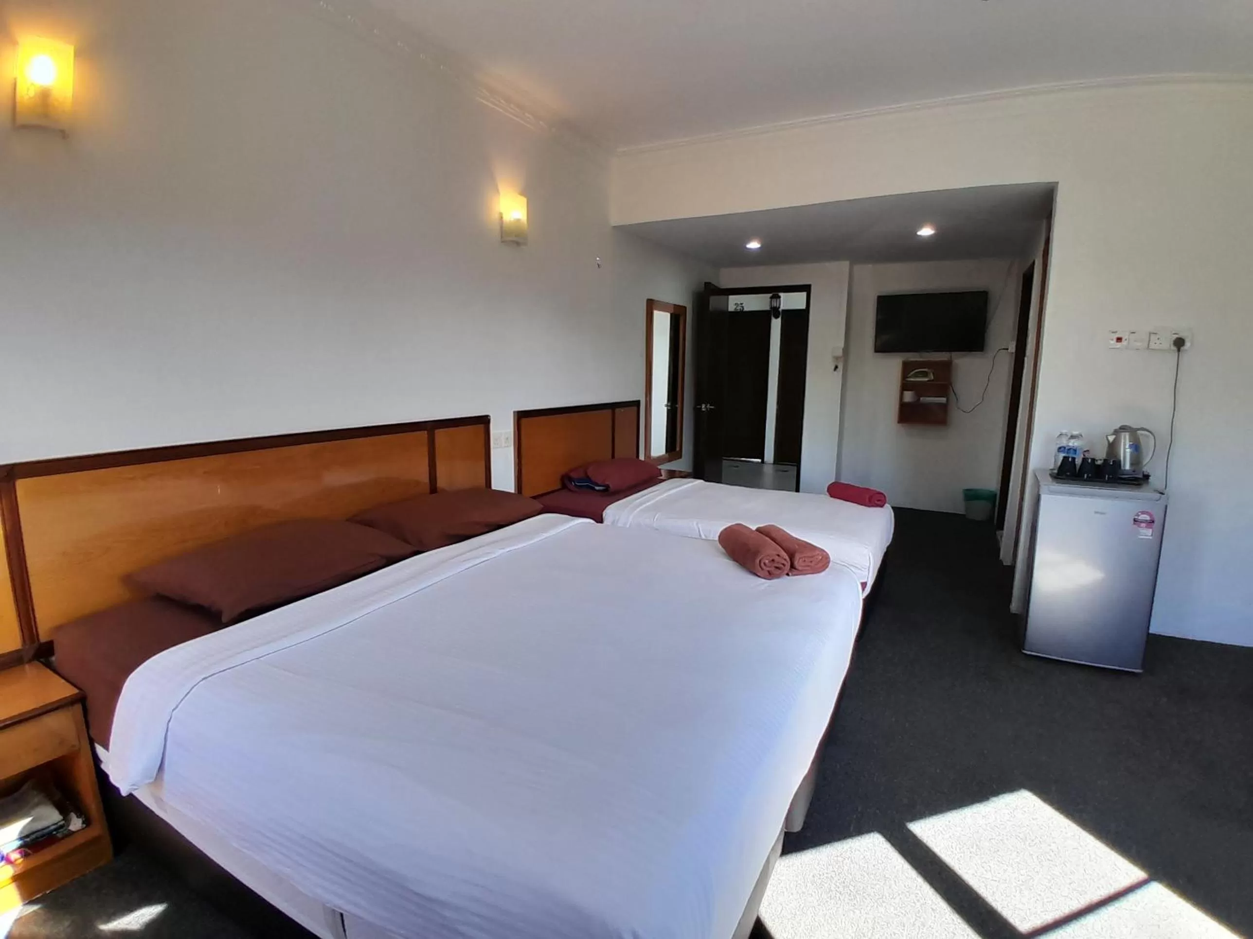 Bed in THE ZULEY HERITAGE HOTEL