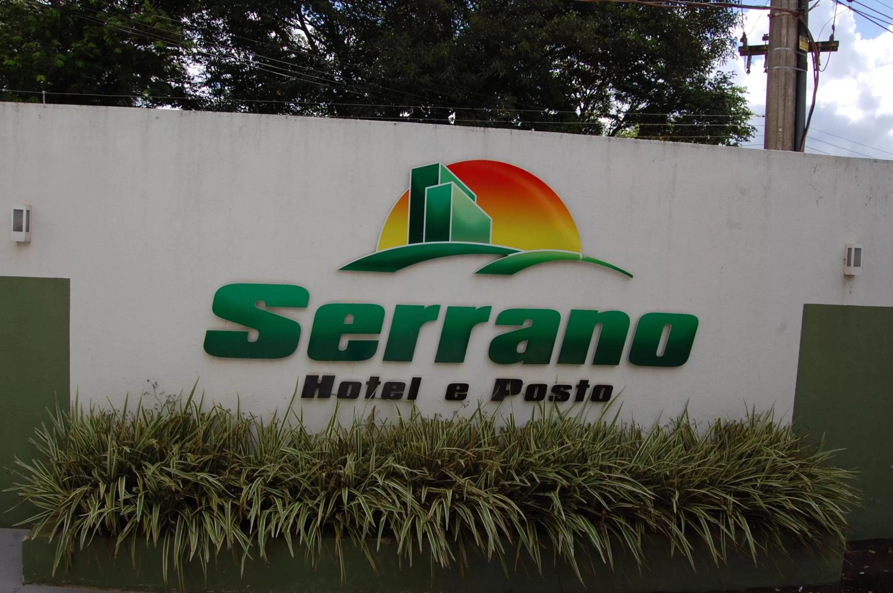 Property logo or sign in Hotel Serrano