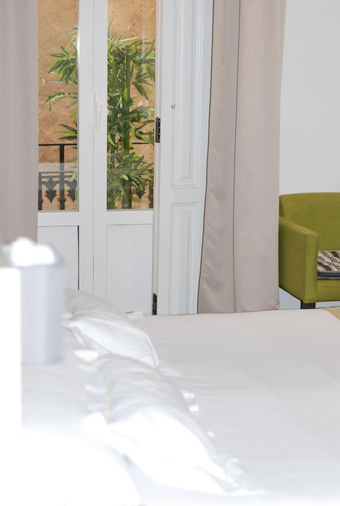 Bed in Hotel San Lorenzo Boutique Plaza