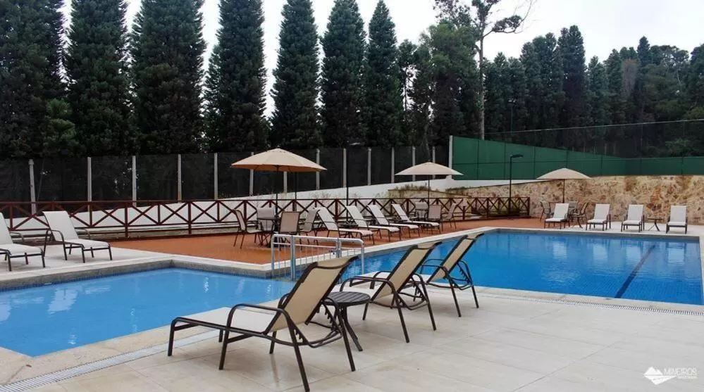 Swimming pool in Apart Hotel Vista Azul - hospedagem nas montanhas