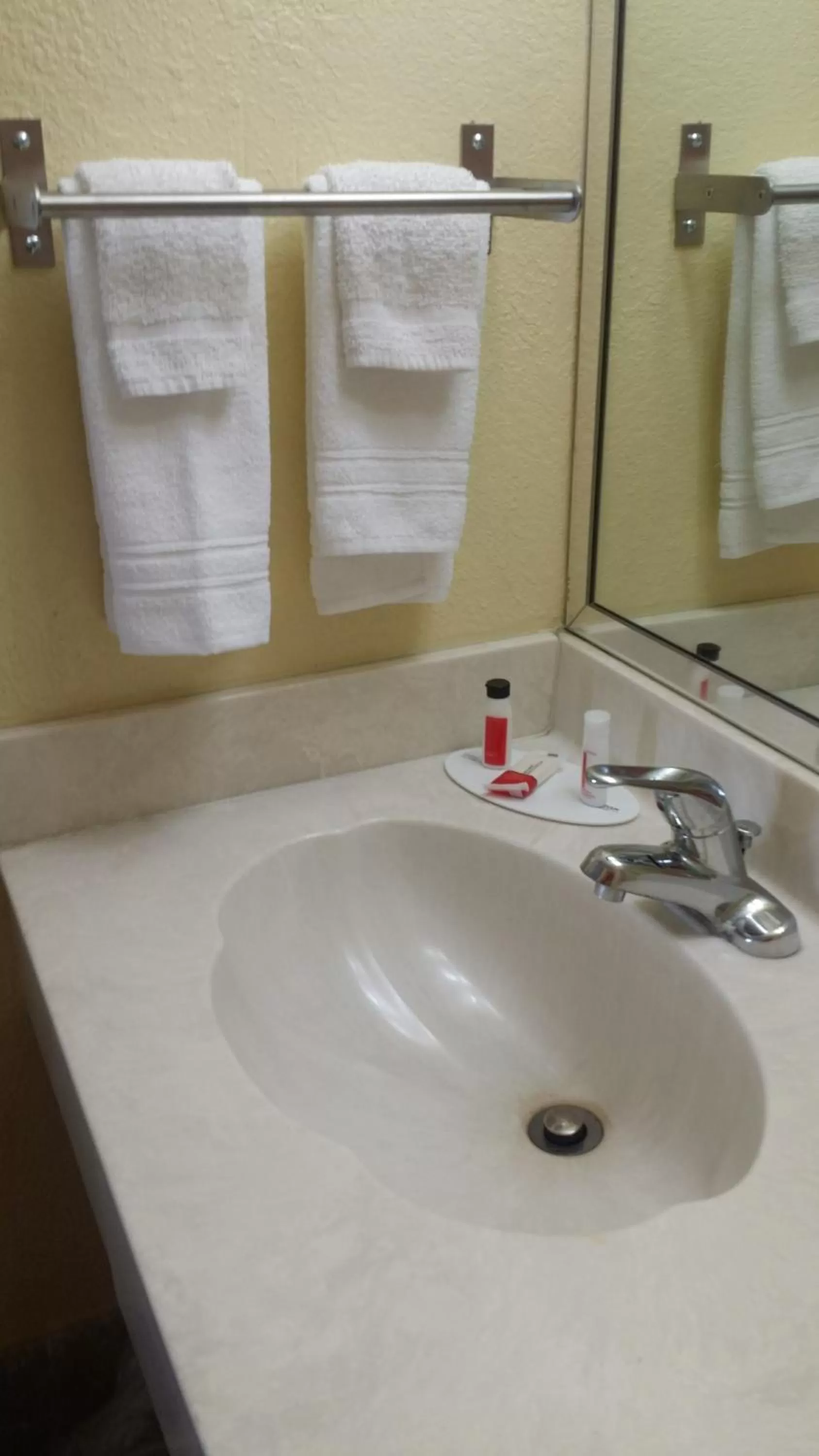 Bathroom in Days Inn by Wyndham Cocoa Cruiseport West At I-95/524