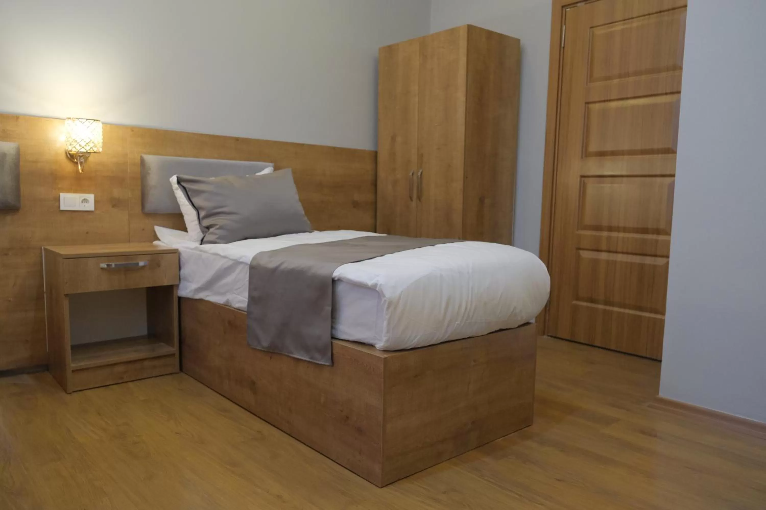 Bed in Adamantides Hotel