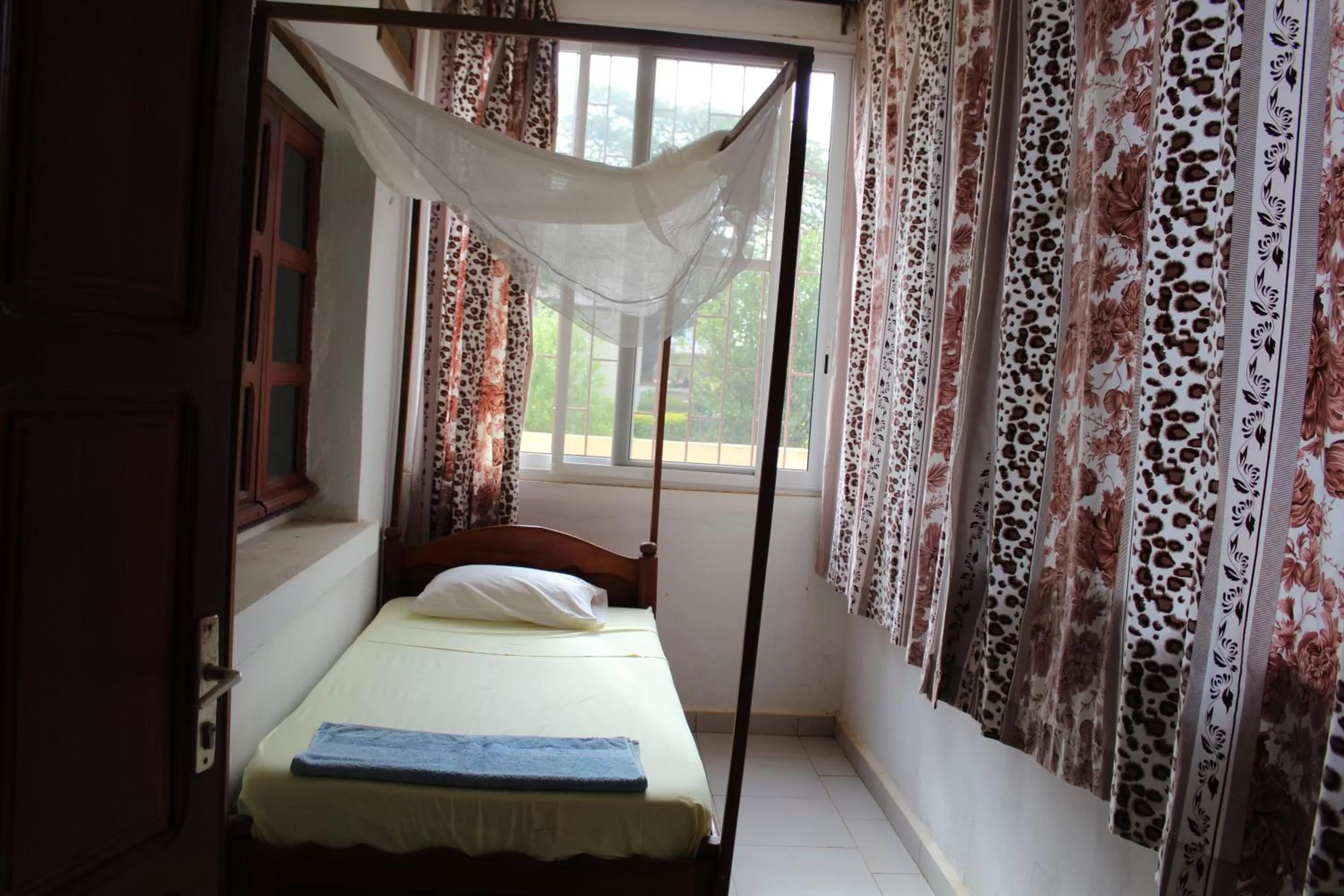 Bedroom, Bed in Centre Lucien Botovasoa