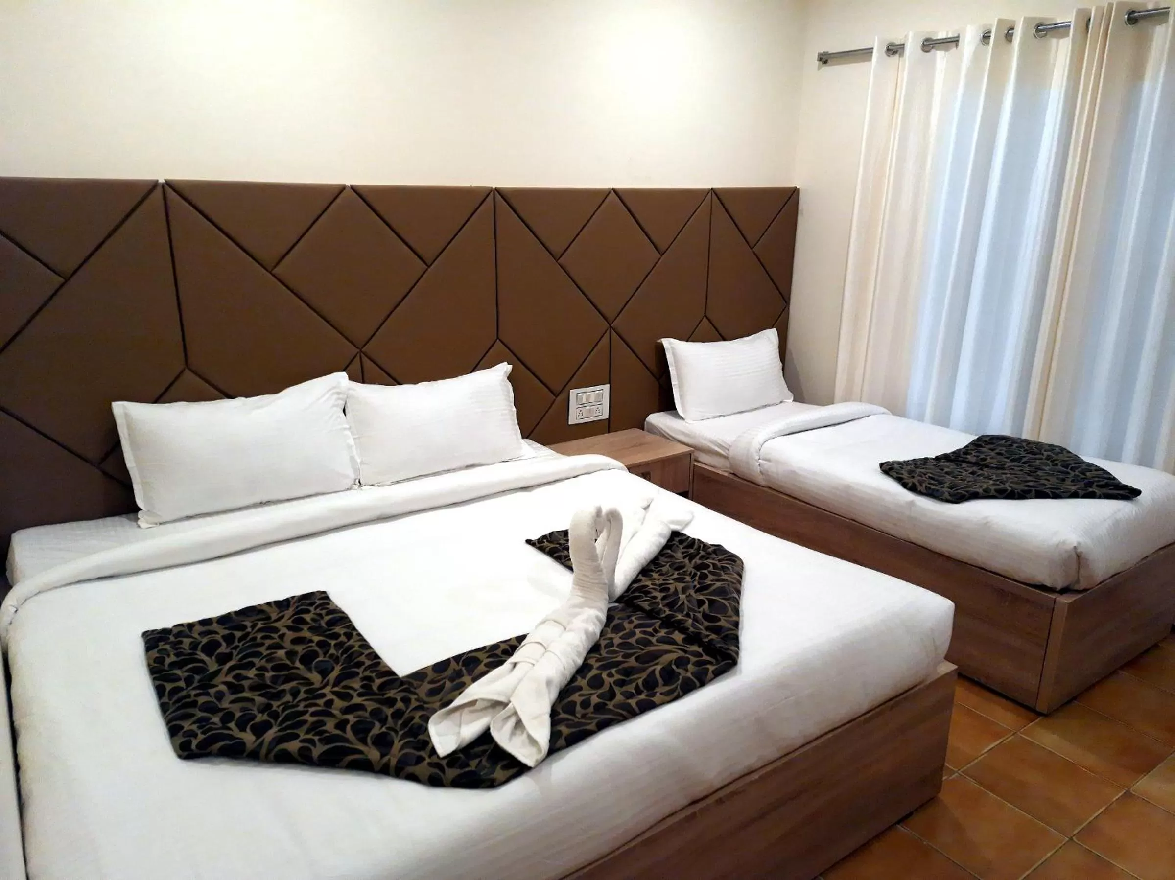Bed in GRAND KODAI SR INN