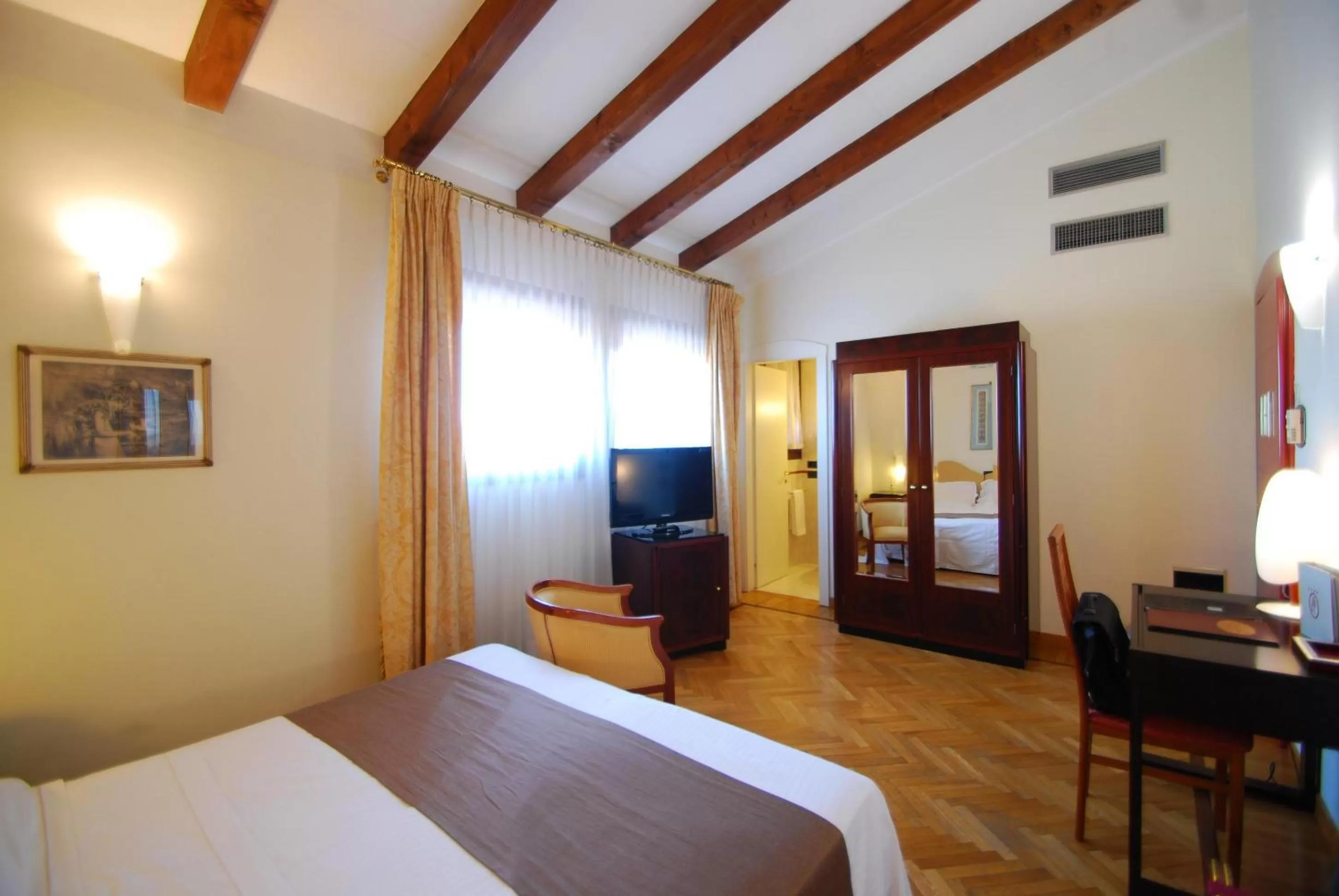 Photo of the whole room, Bed in Alla Rocca Hotel Conference & Restaurant