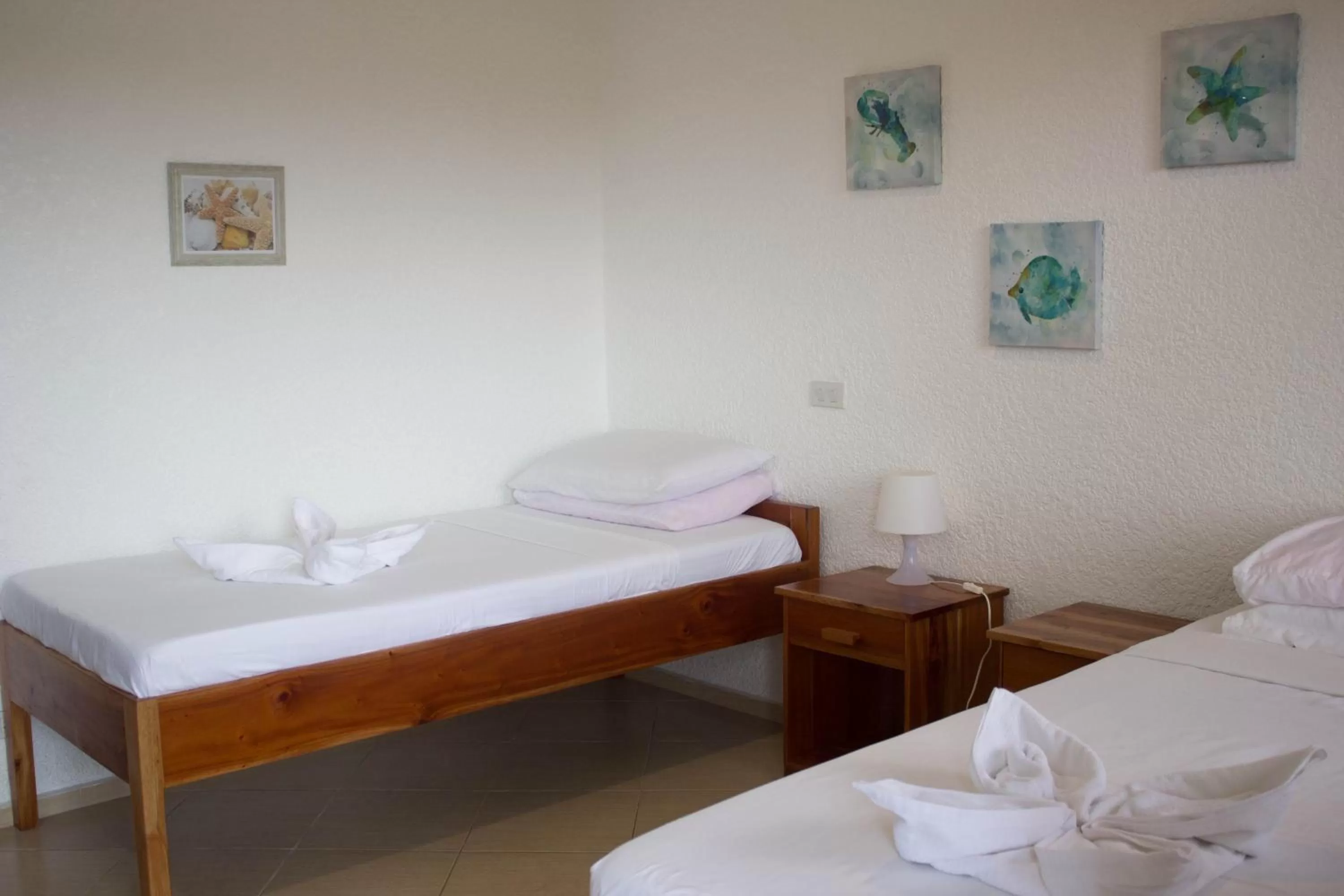 Bed in Jugalis Hotel and Restaurant