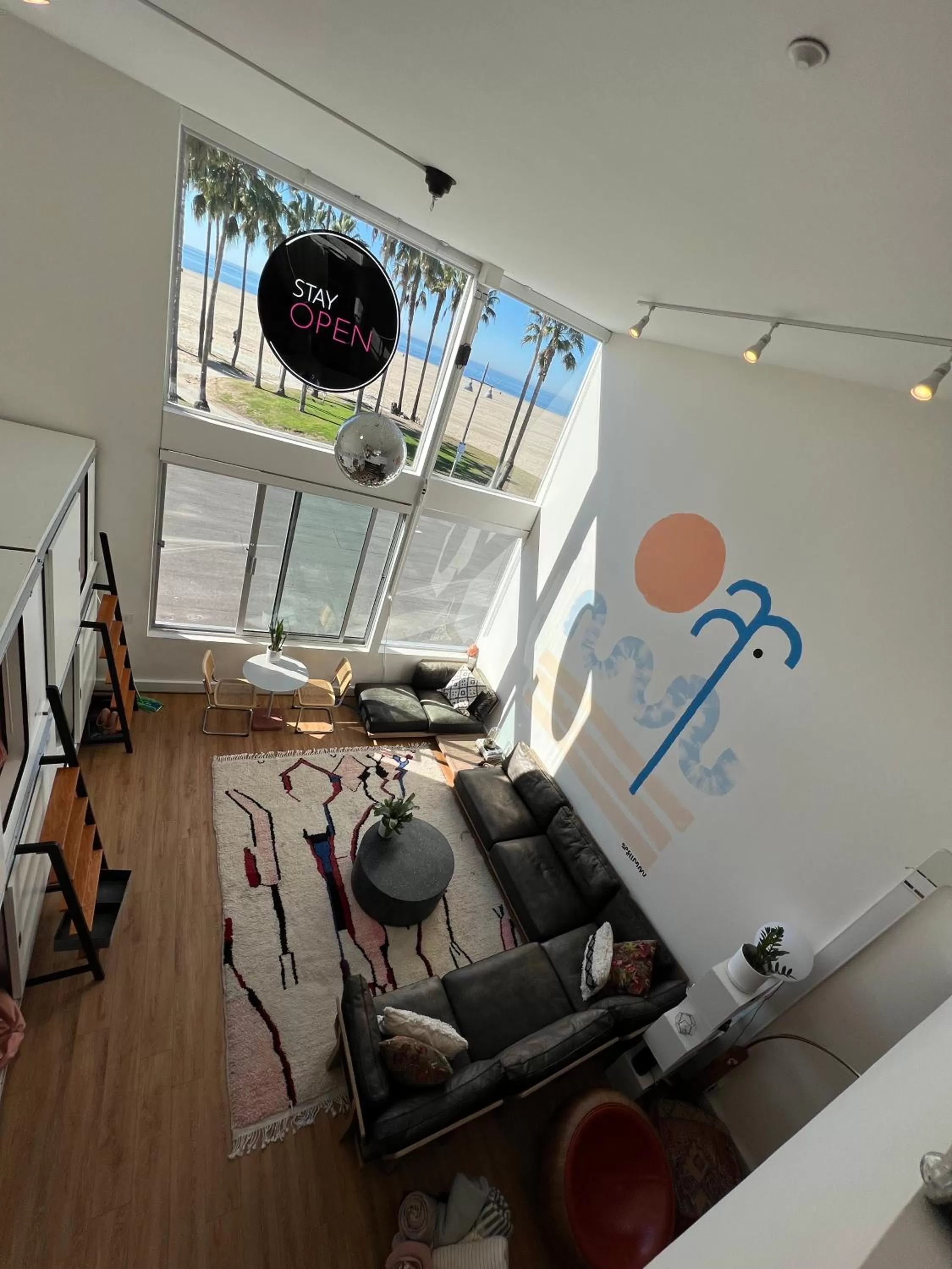 Bed, Seating Area in STAY OPEN Venice Beach