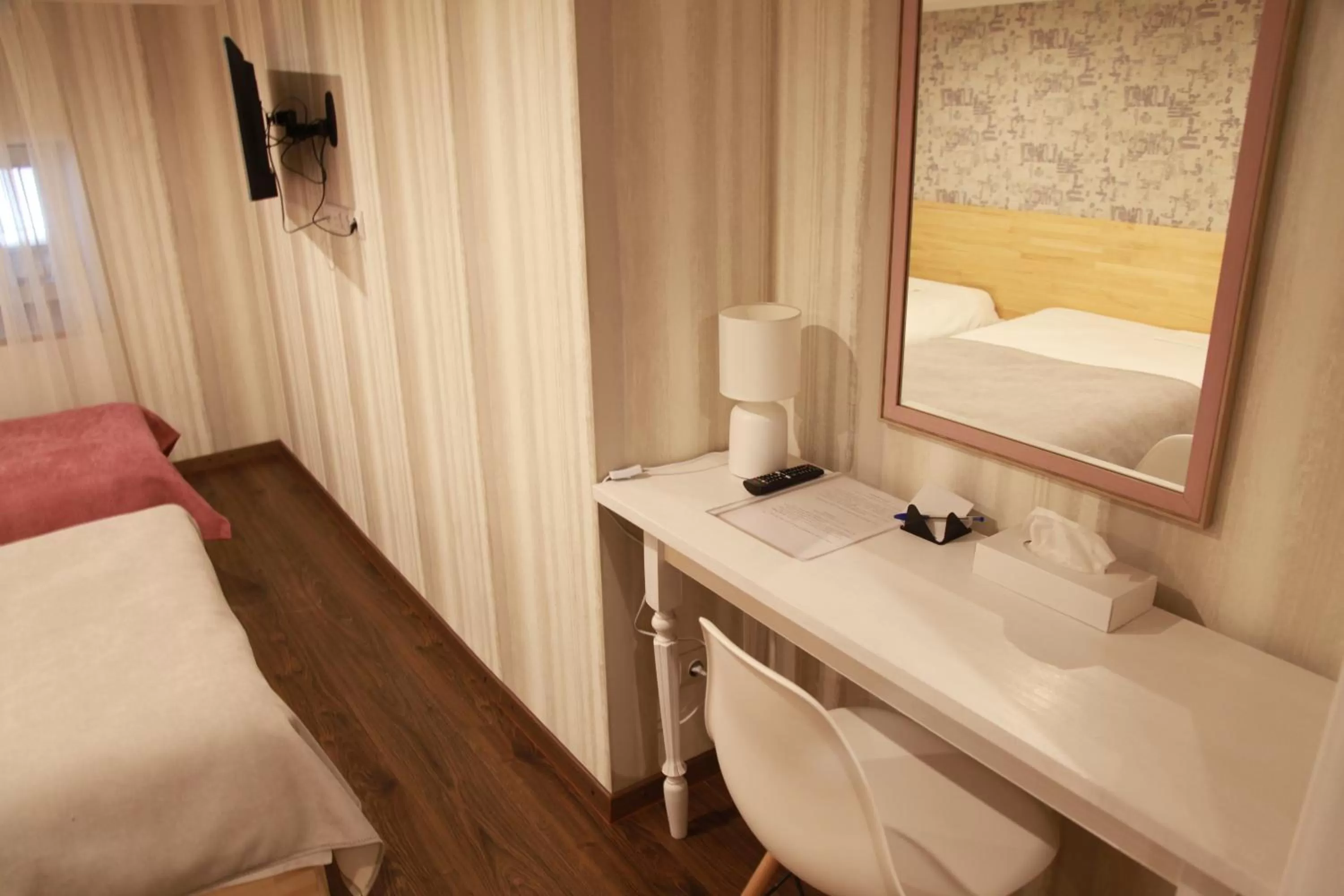 Bed in WINE & ROSE BOUTIQUE HOTEL