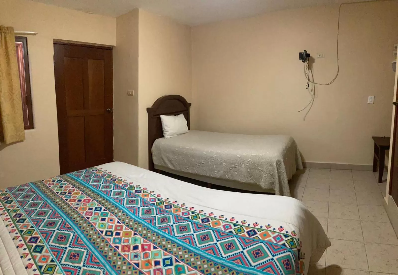 Bed in Mansion Serrano Hotel