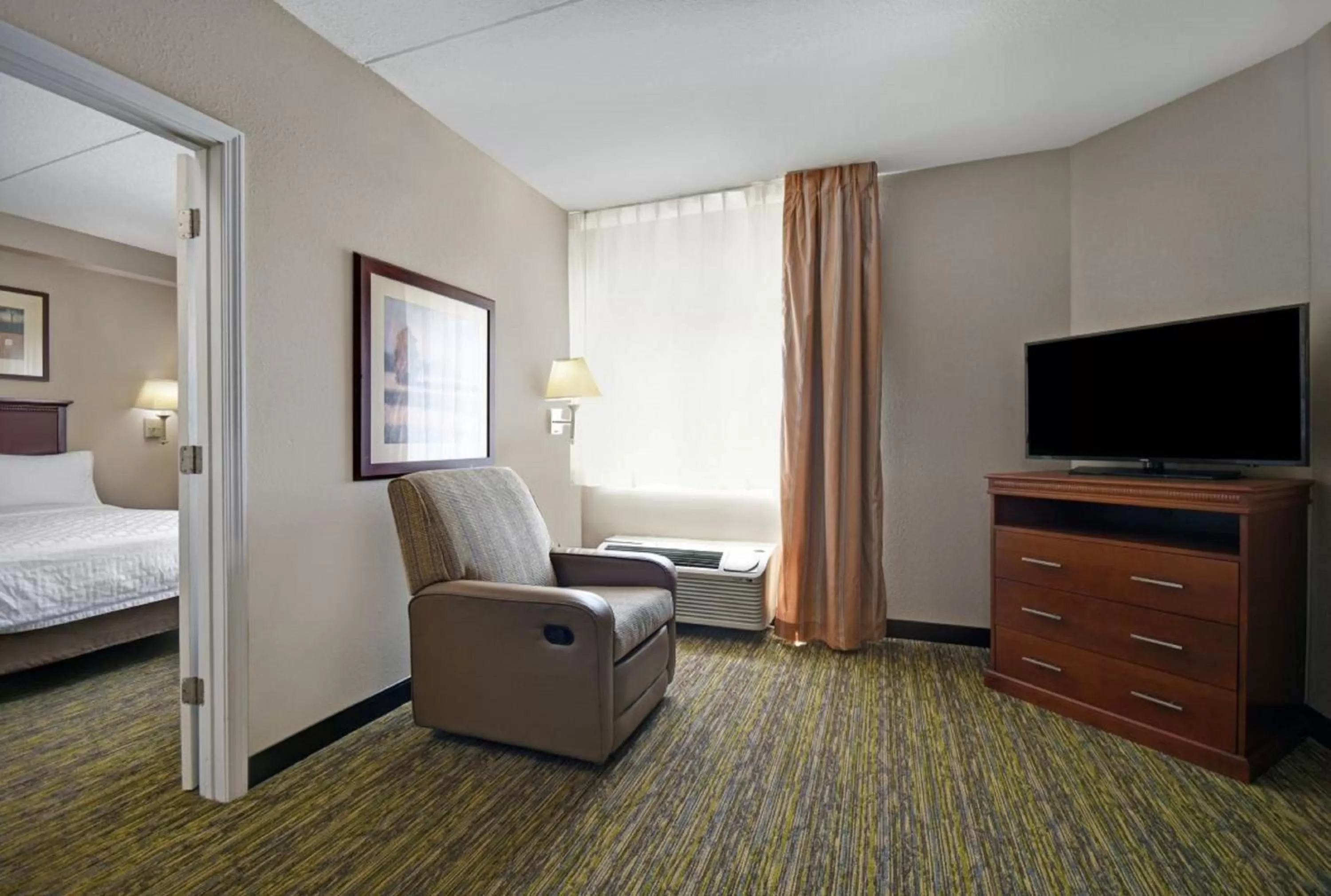 Photo of the whole room, Bed in Candlewood Suites Mooresville Lake Norman,NC by IHG