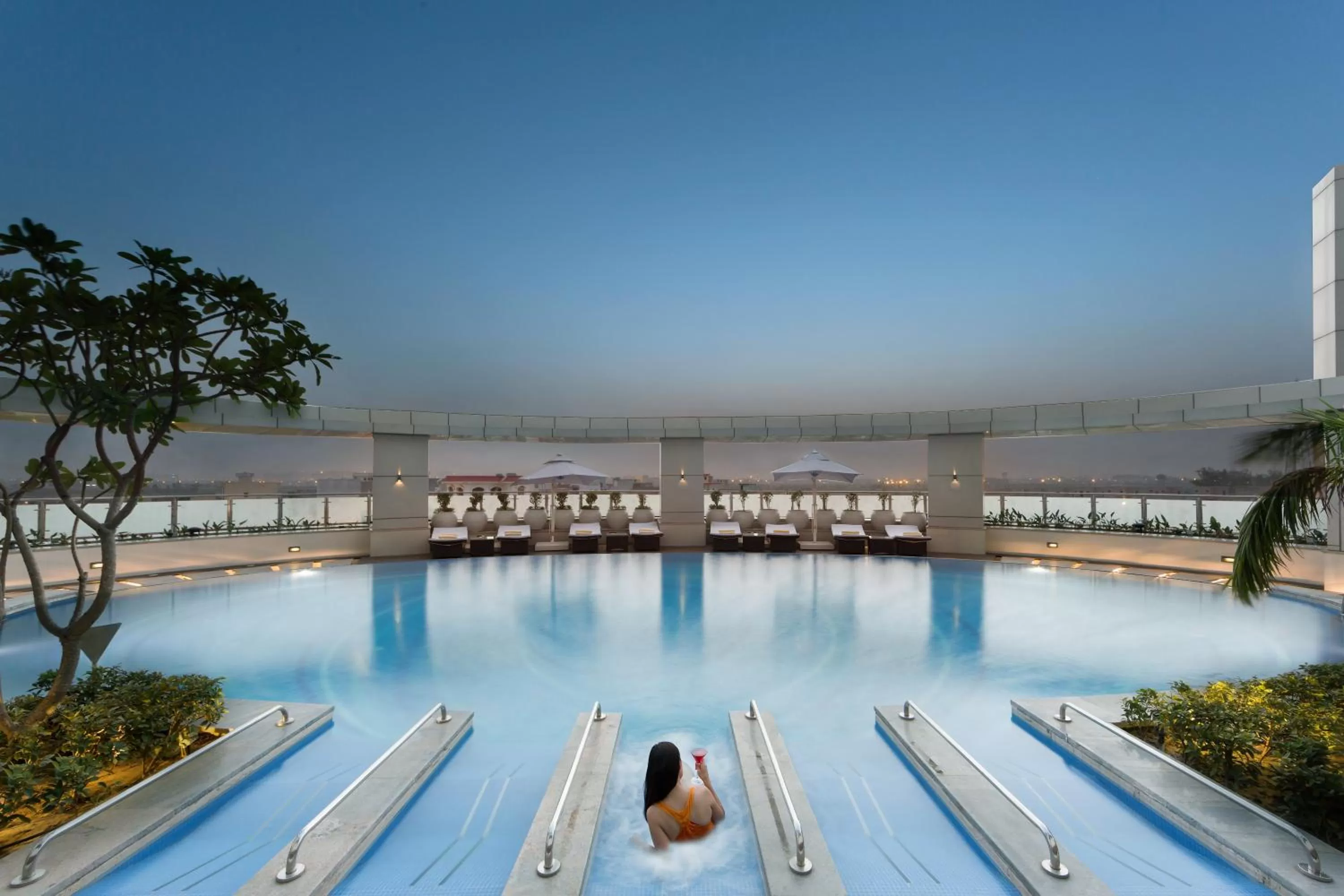 Swimming pool in Crowne Plaza Greater Noida by IHG