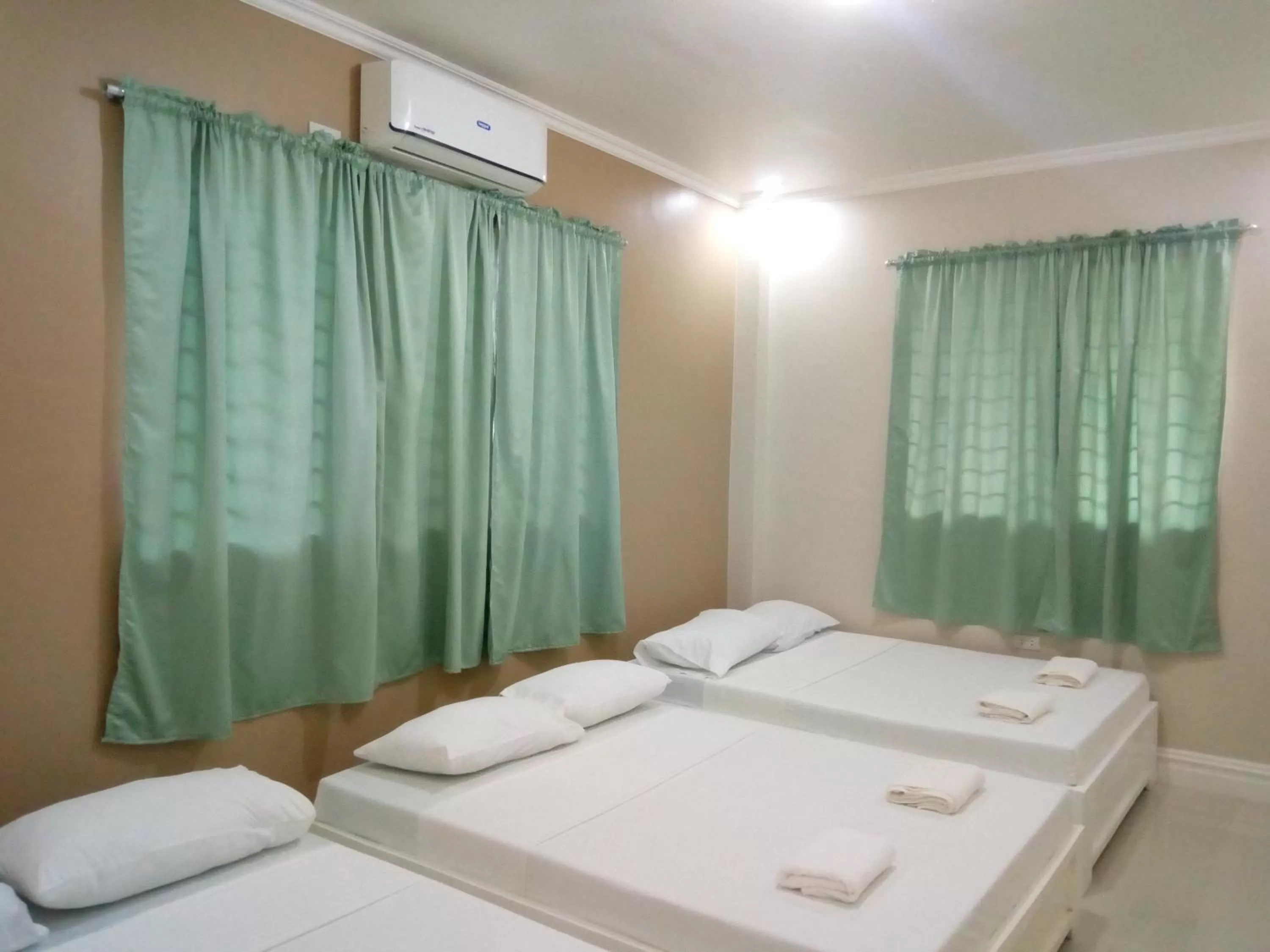 Bed in Sandscape Hotel