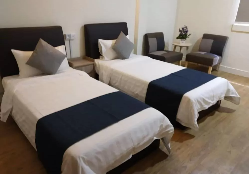 Bed in Star Seasons Hotel