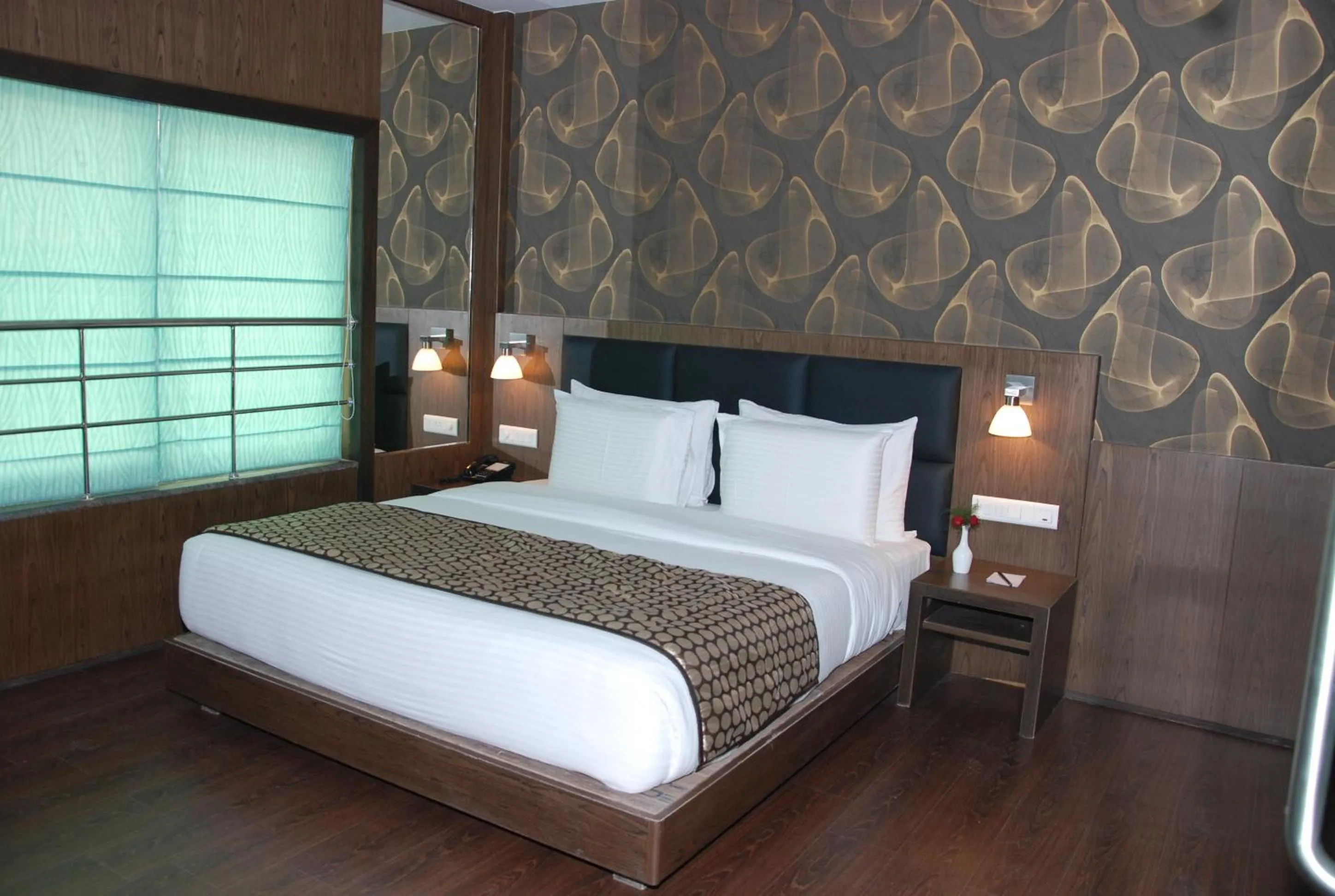 Photo of the whole room, Bed in Pride Ananya Resorts