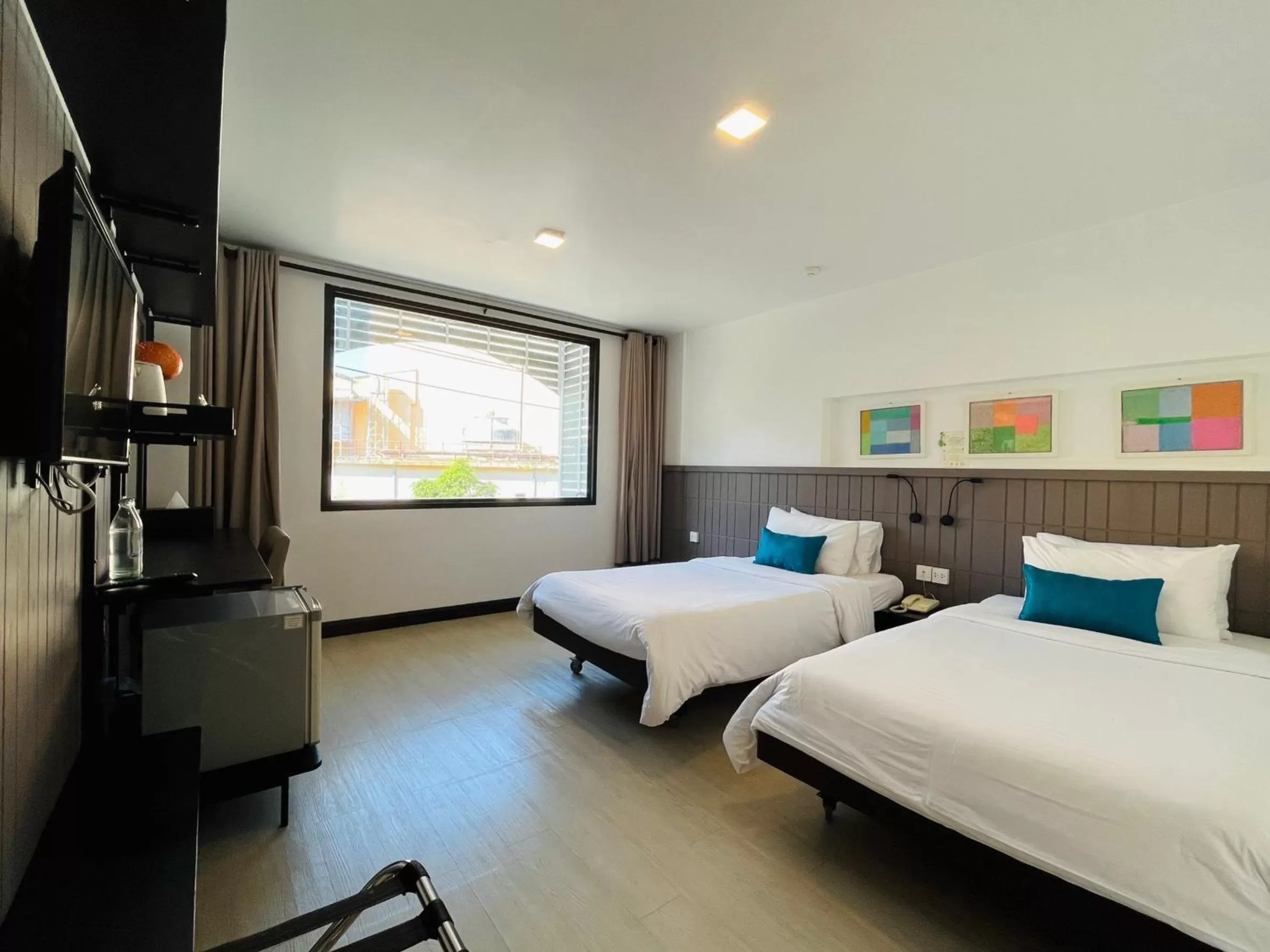 Bed in The Mantrini Chiang Rai