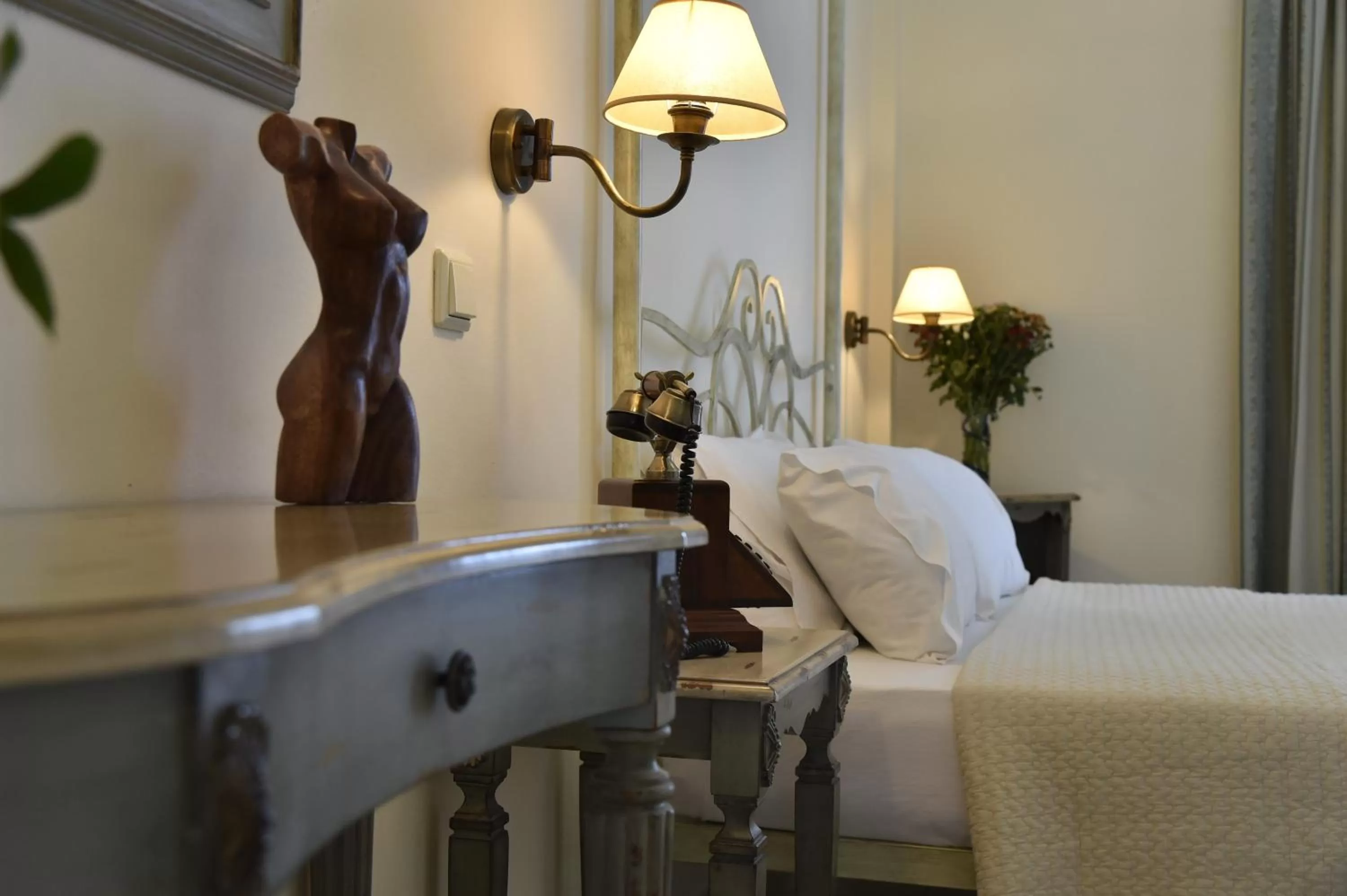 Bed in Ikaros Art Hotel