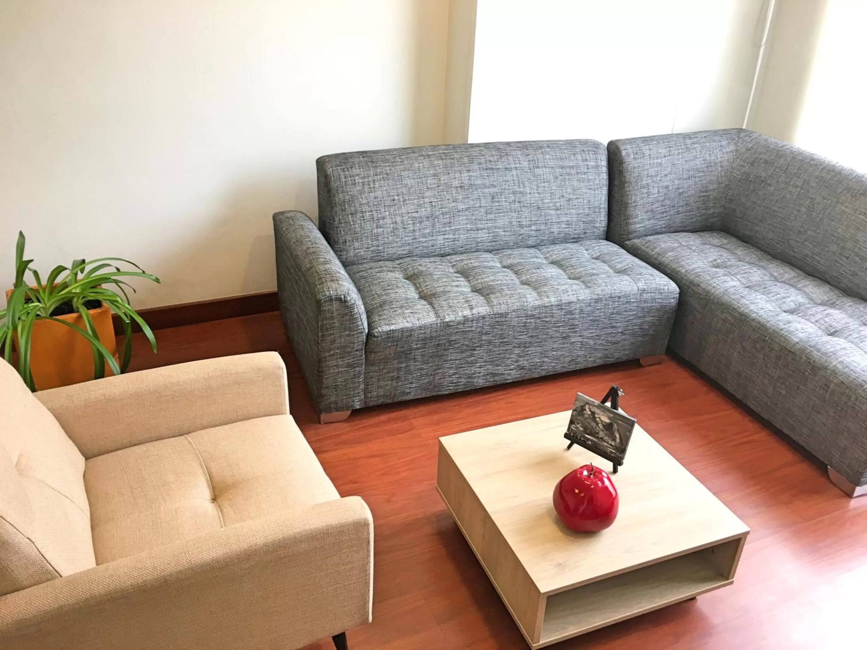 Seating area in Cora 96 Street Apartments