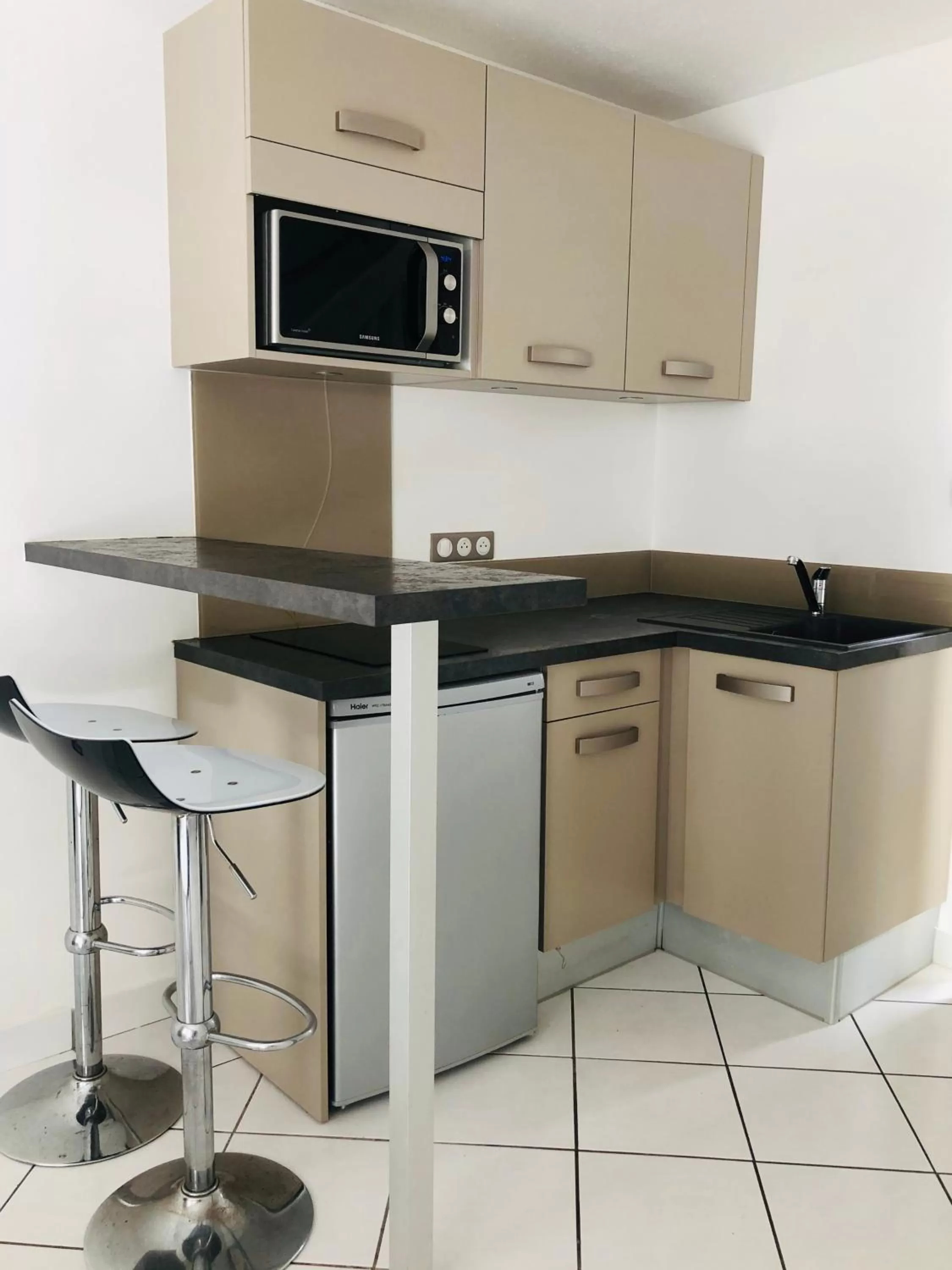 Kitchen or kitchenette in Centr'Hotel