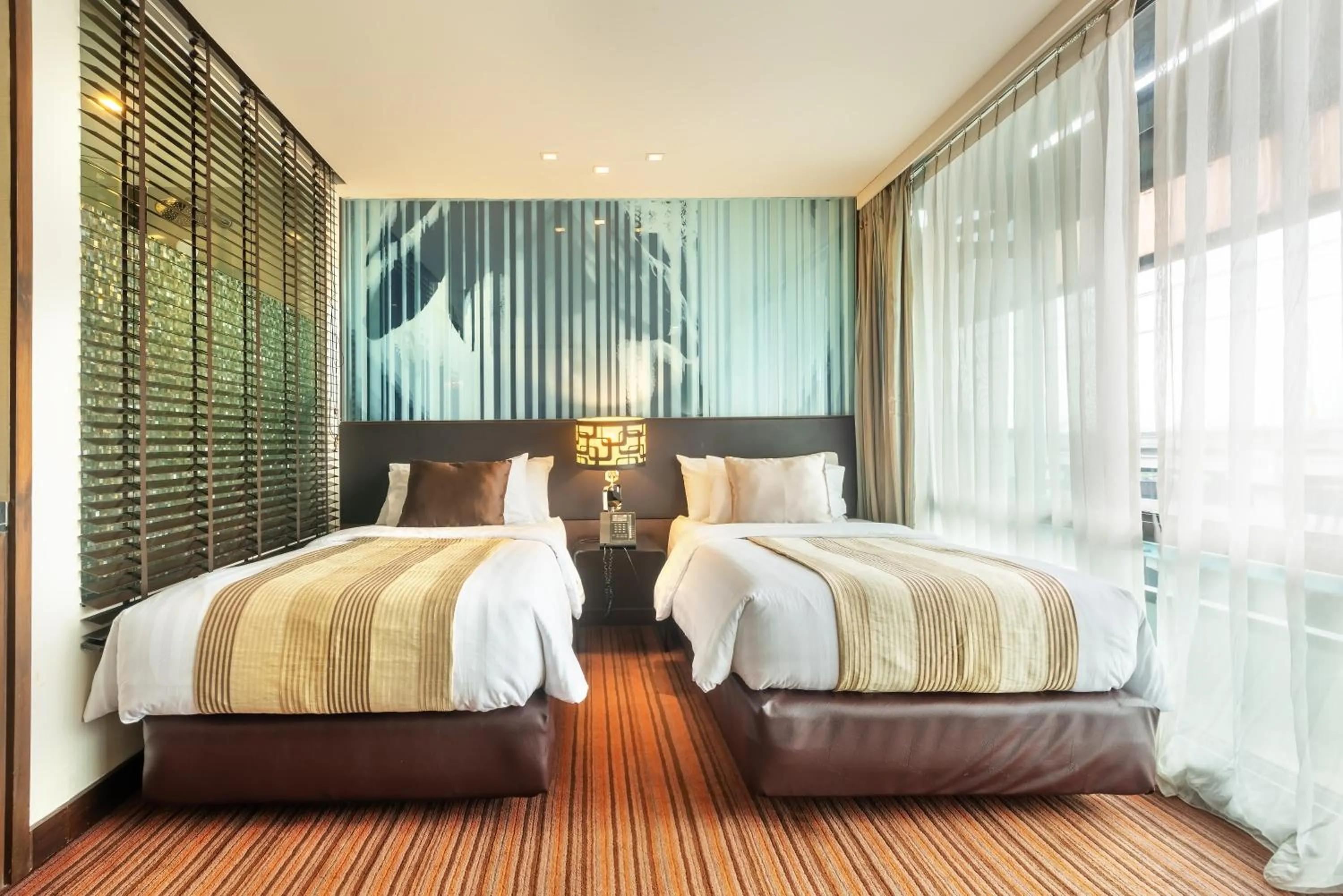 Bed in M2 de Bangkok Hotel