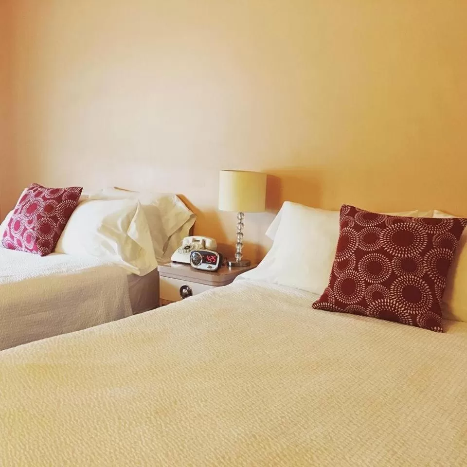 Bed in Holiday Music Motel