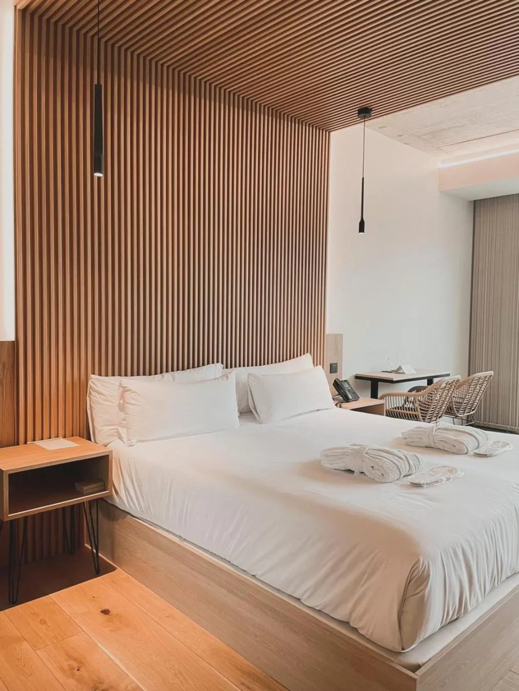 Bed in Atmos Hotel Boutique