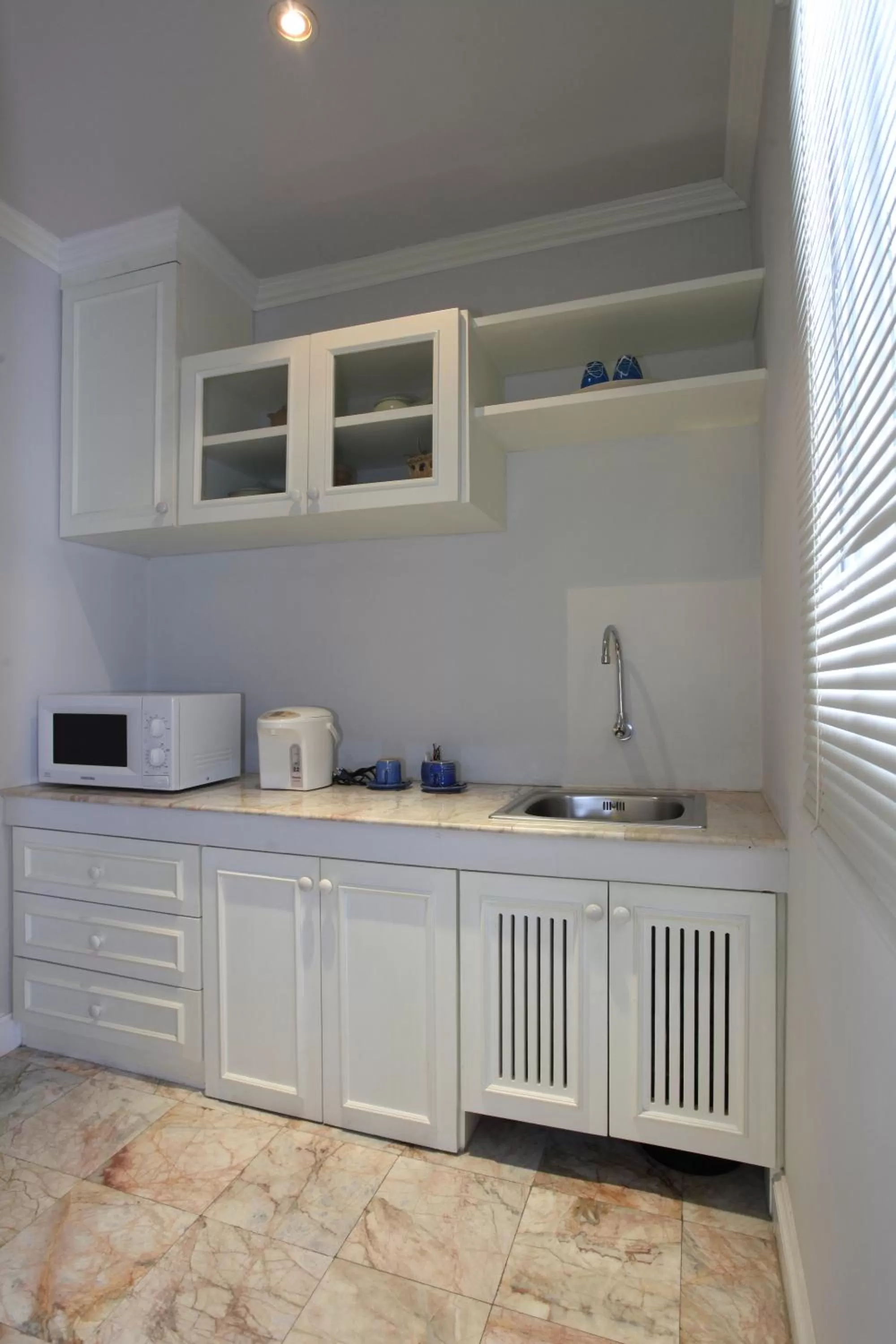 Kitchen or kitchenette in At Pingnakorn Nimman Hotel