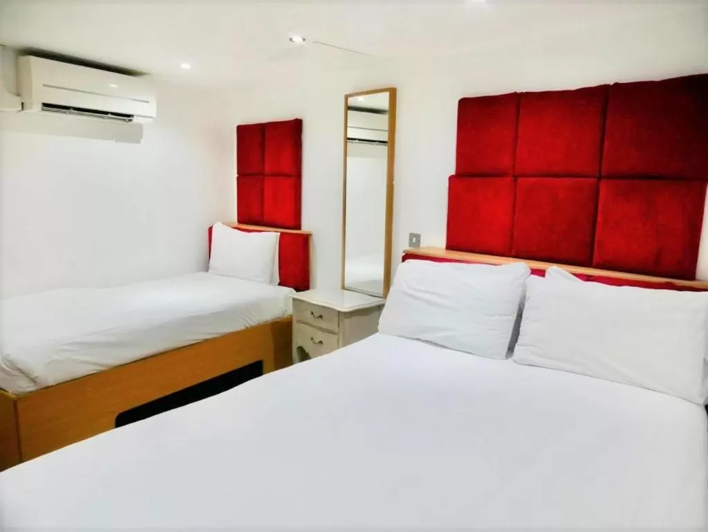 Bed in Print Works Hotel