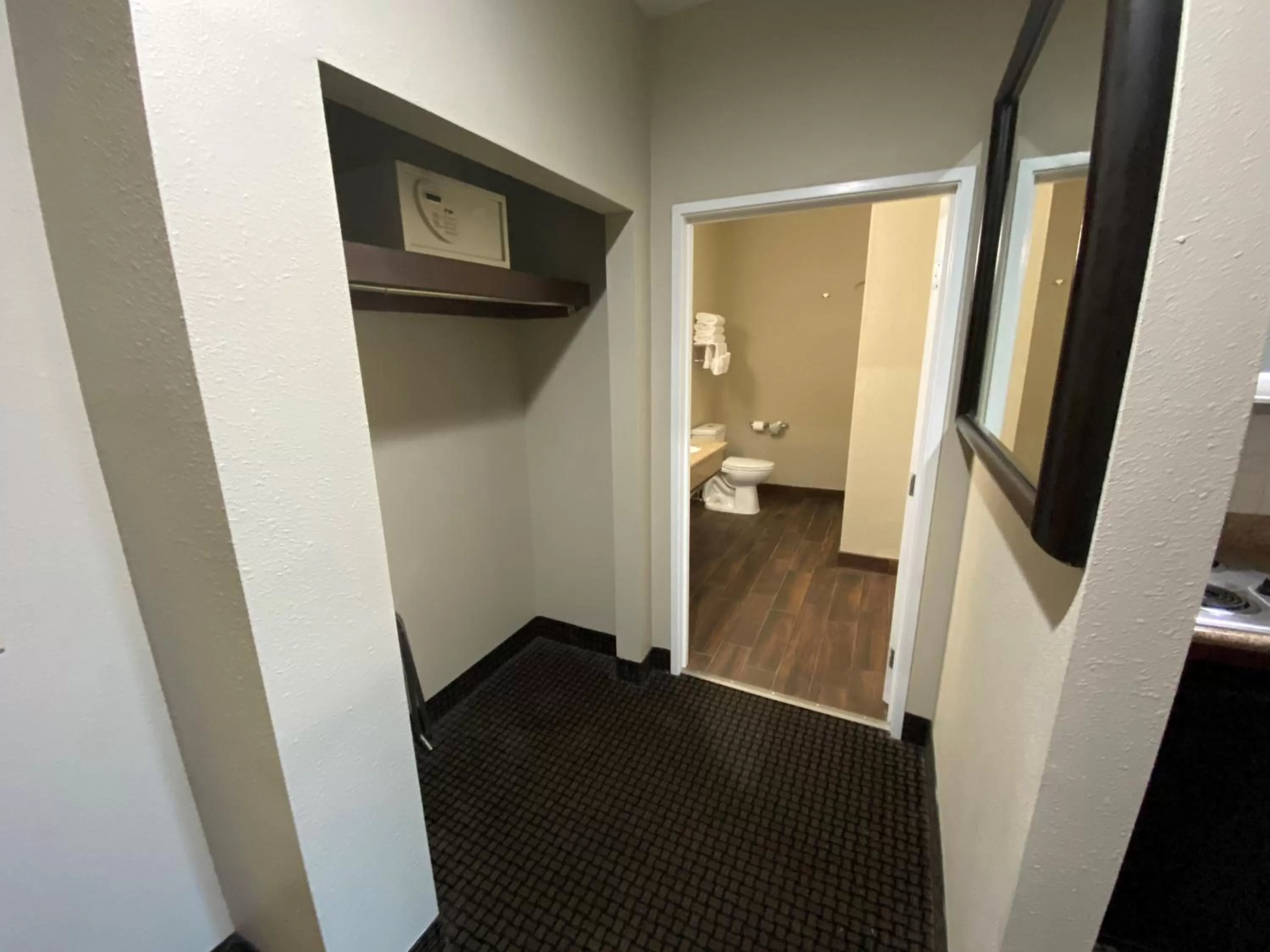 Toilet in Baymont by Wyndham Colorado Springs