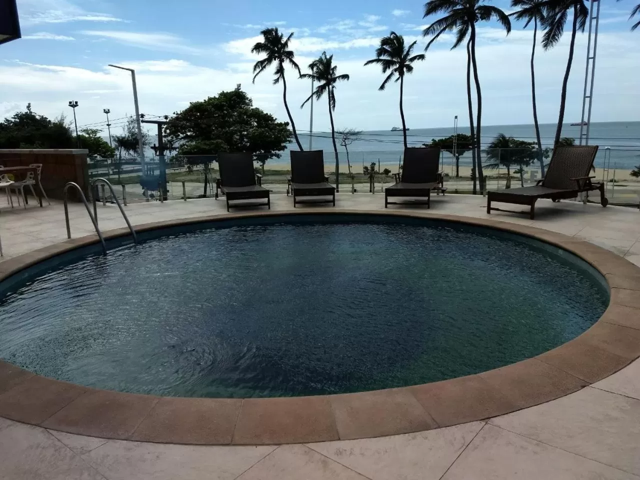 Swimming pool in Iracema Residence Hotel Flat