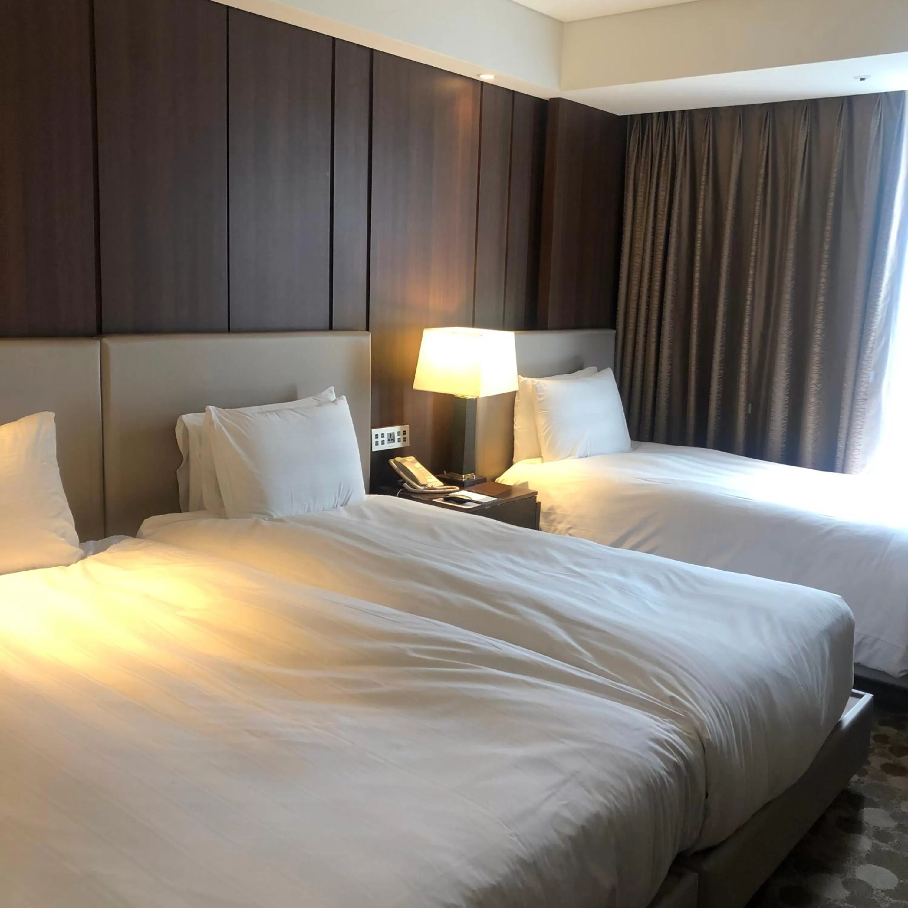 Bed in LOTTE CITY HOTEL Daejeon