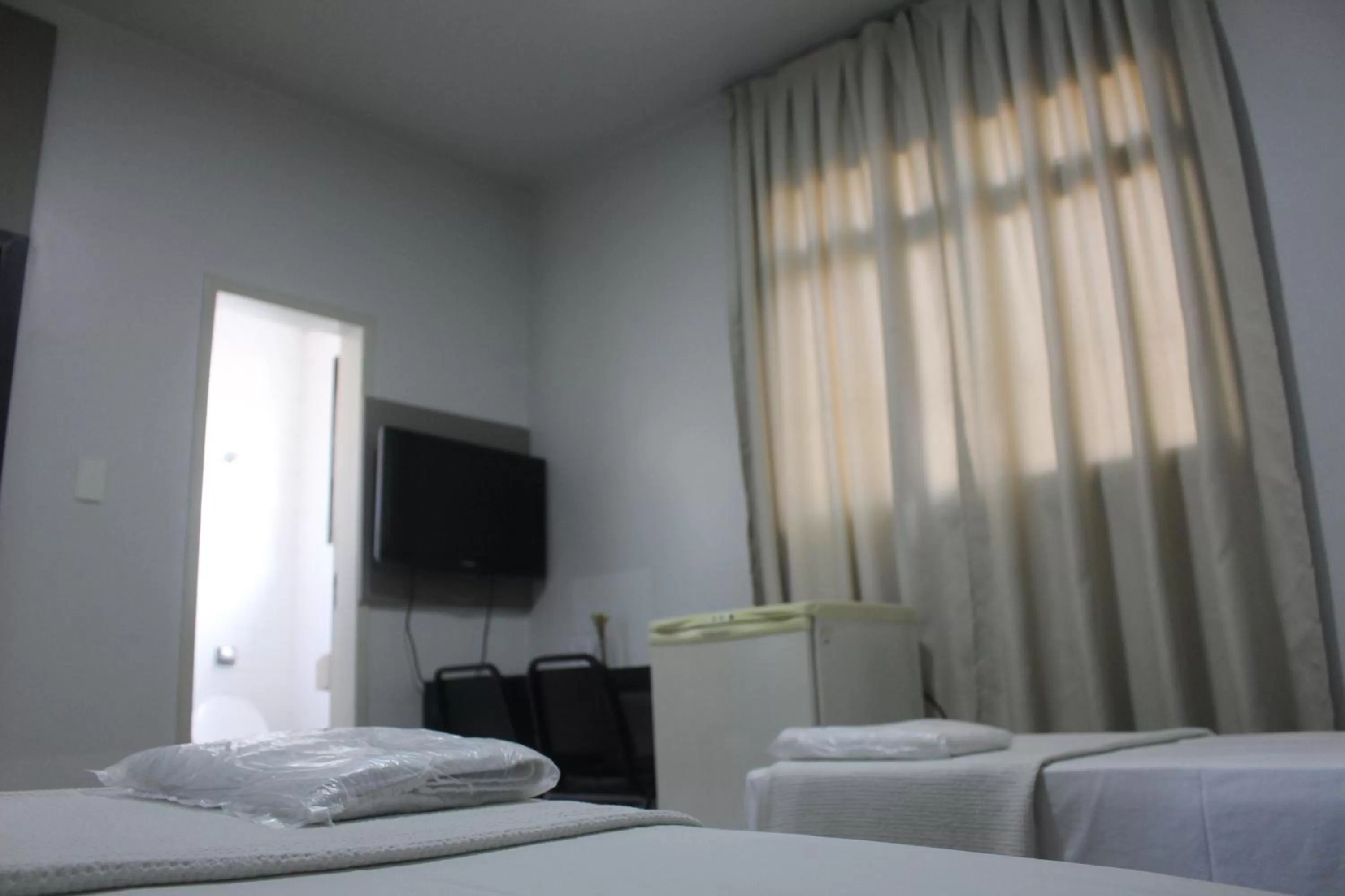 TV and multimedia, Bed in Hotel Oscar Blue Montes Claros