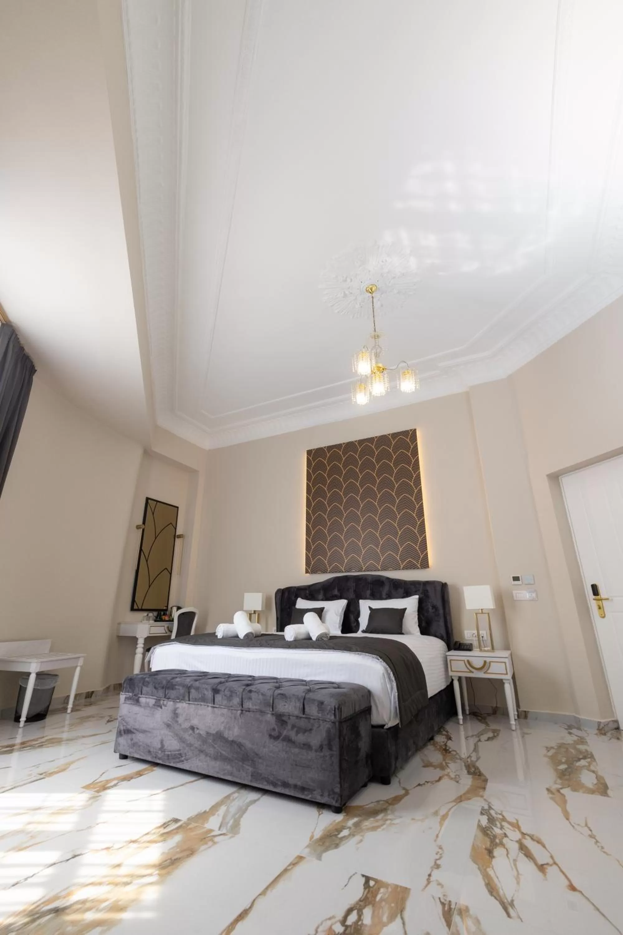 Bed in Modern Revival Luxury Hotel