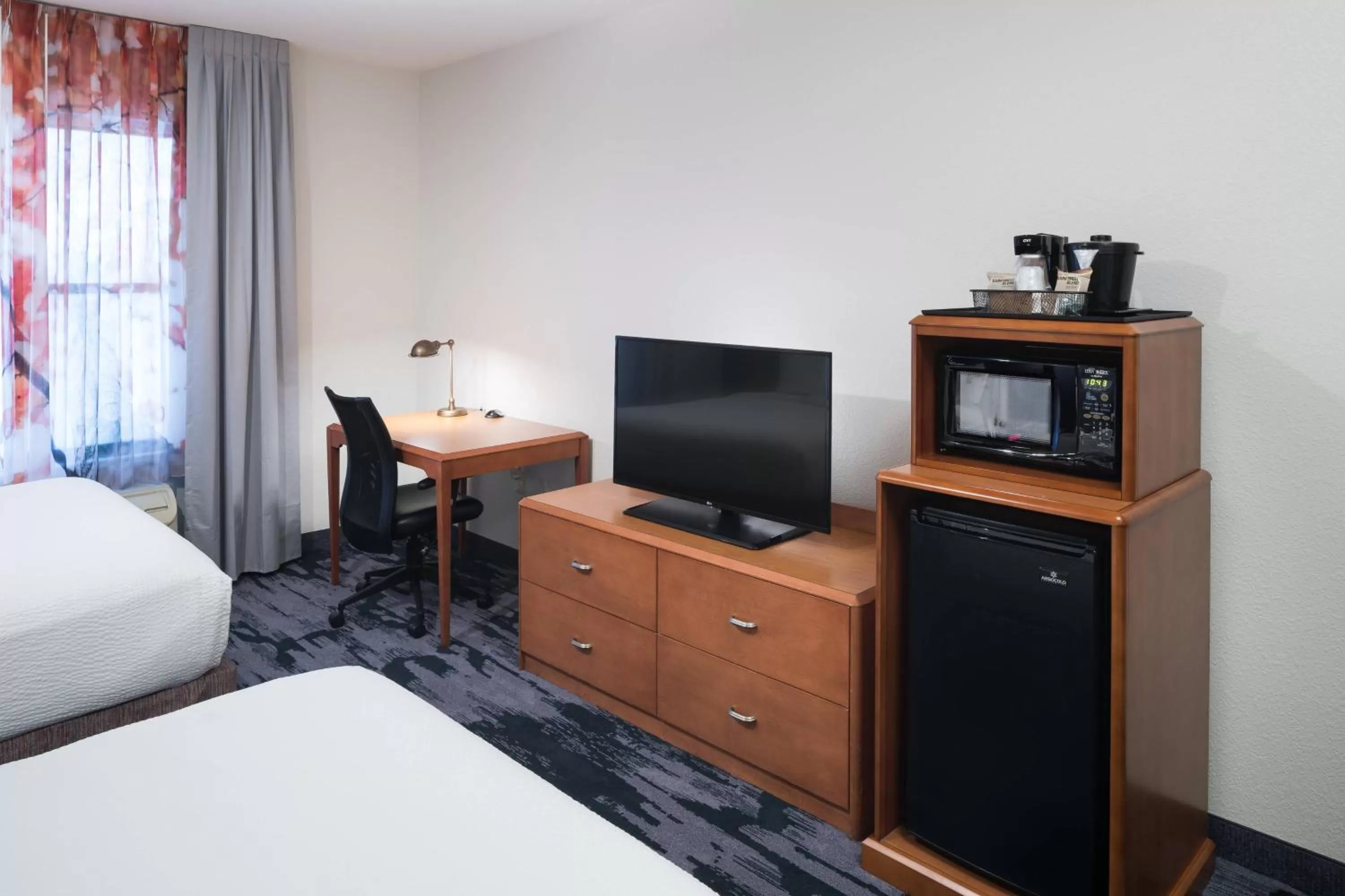 Photo of the whole room, Bed in Fairfield Inn Suites by Marriott Orlando At SeaWorld