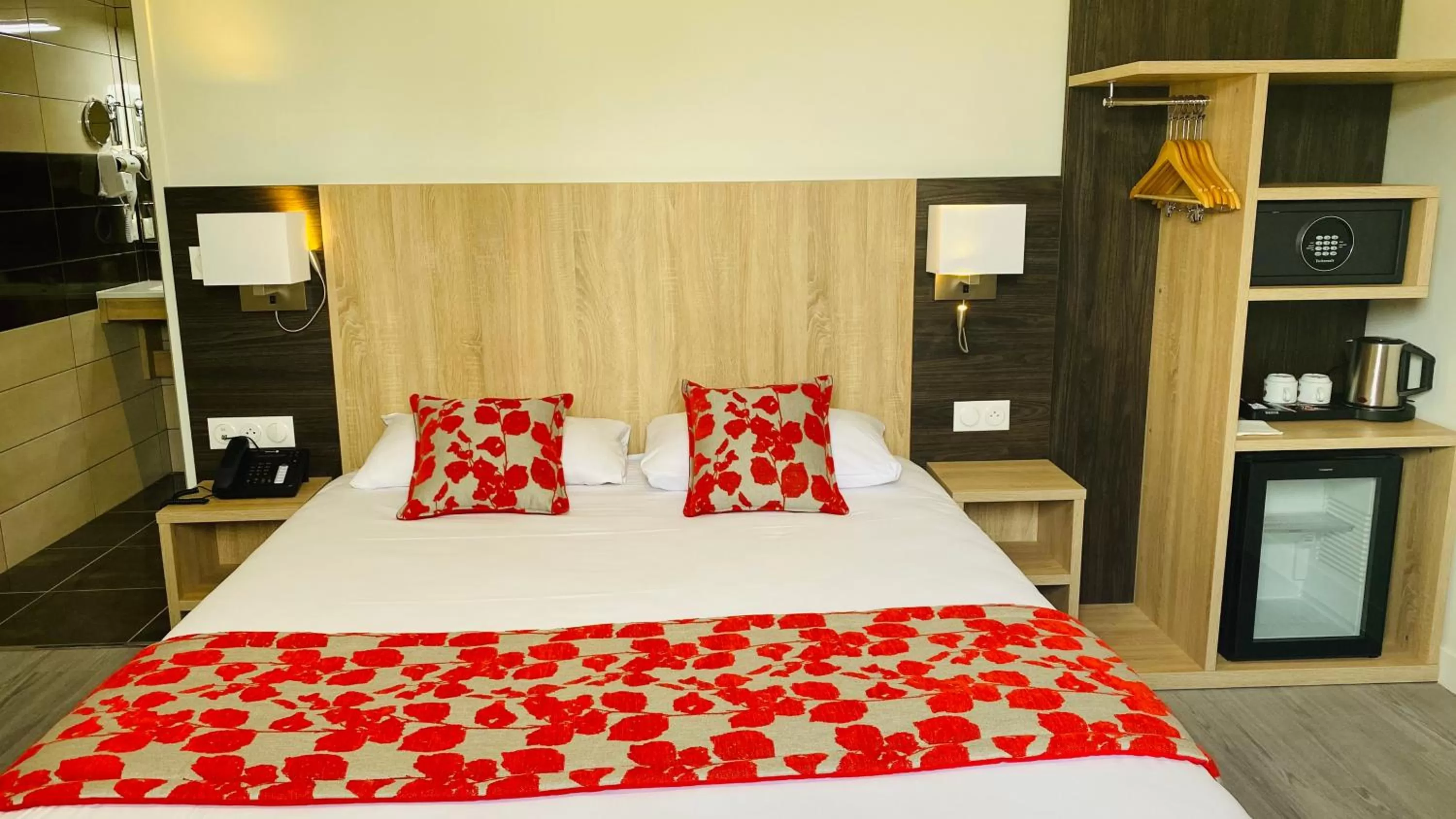 Bed in Hotel Martinez Grenay