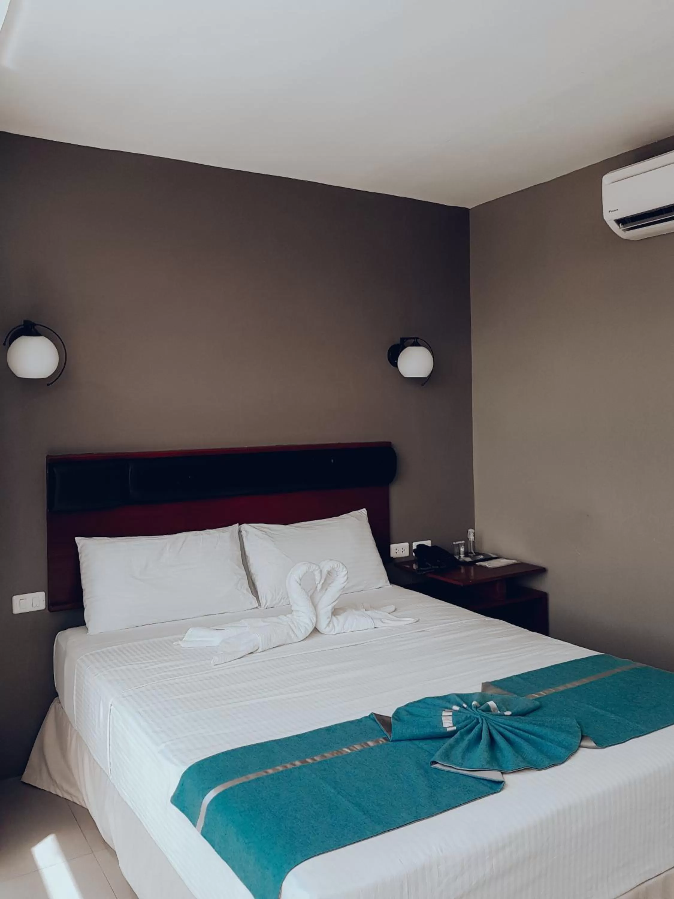 Bed in Dosi Hotel PH