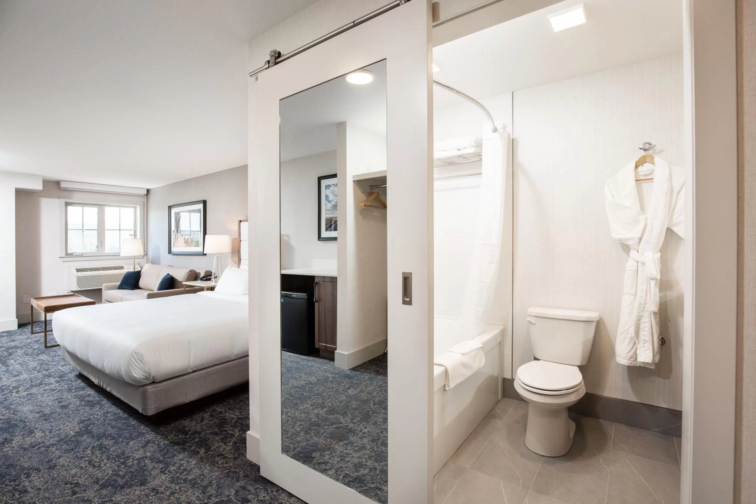Bathroom, Bed in Pomeroy Hotel Fort McMurray