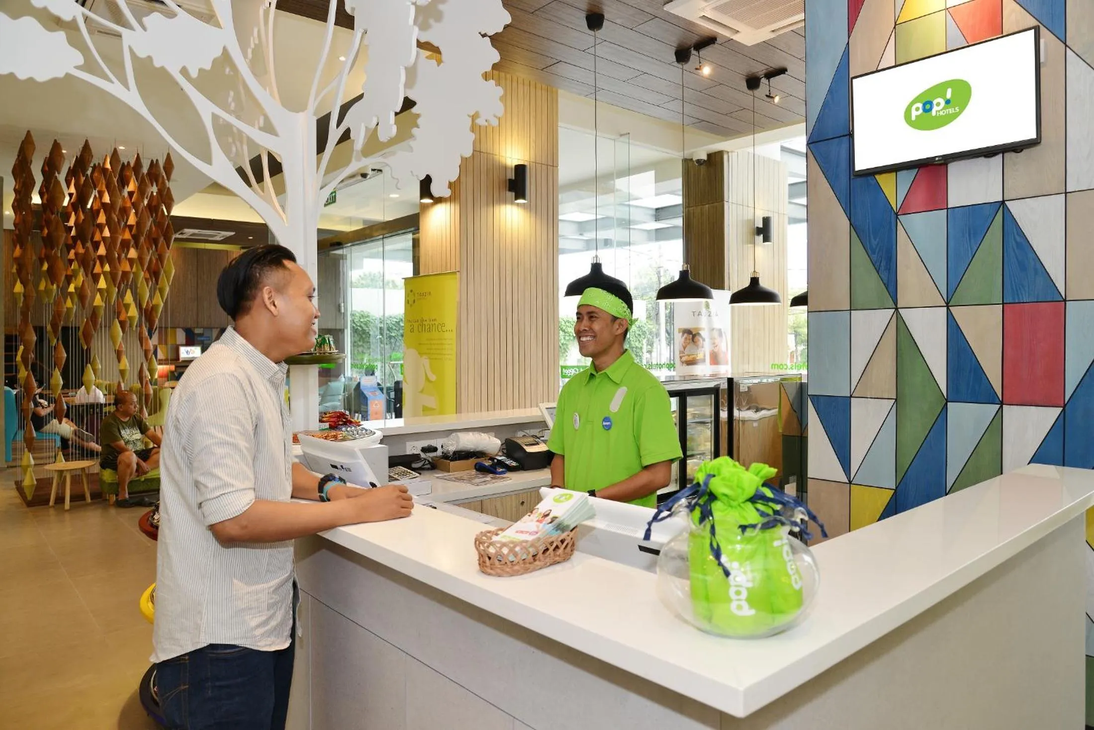 Staff in POP! Hotel Pasar Baru Jakarta