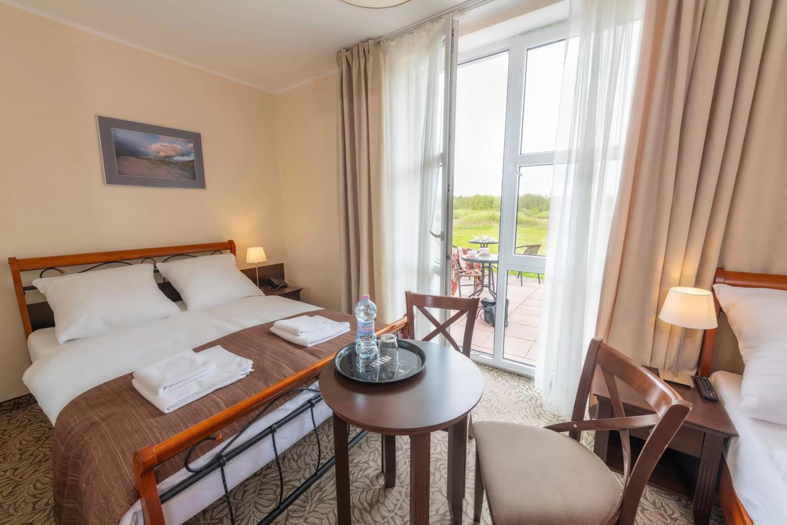 Bed in Hotel Mona Lisa Wellness & Spa