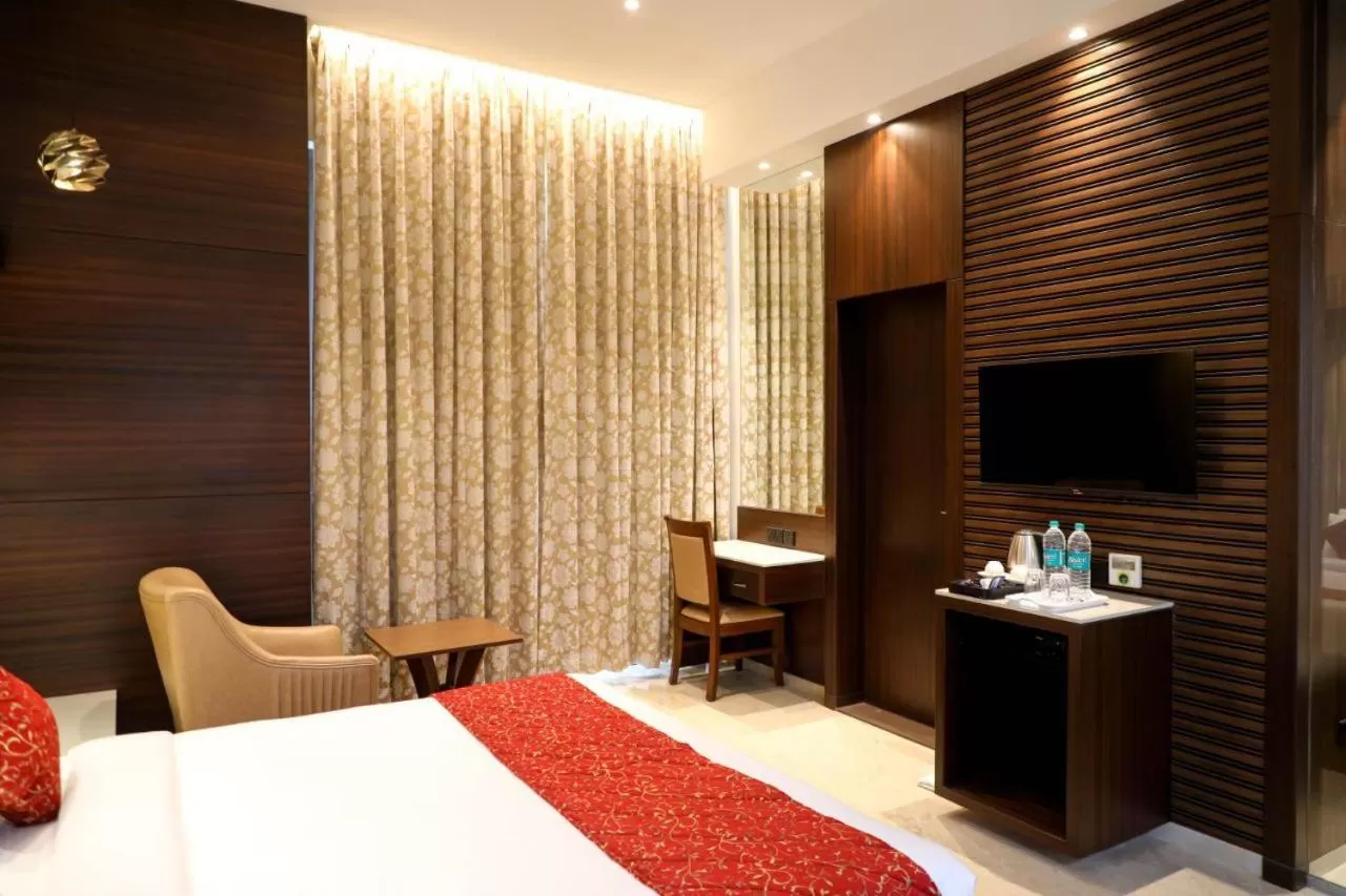 Bed in Hotel Gurudev Grand